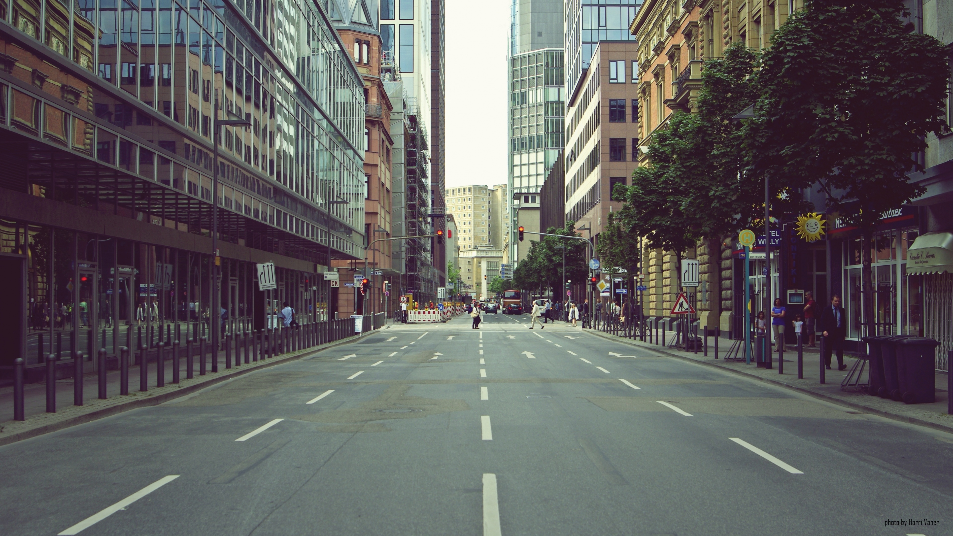 City street with modern and old buildings HD Wallpaper