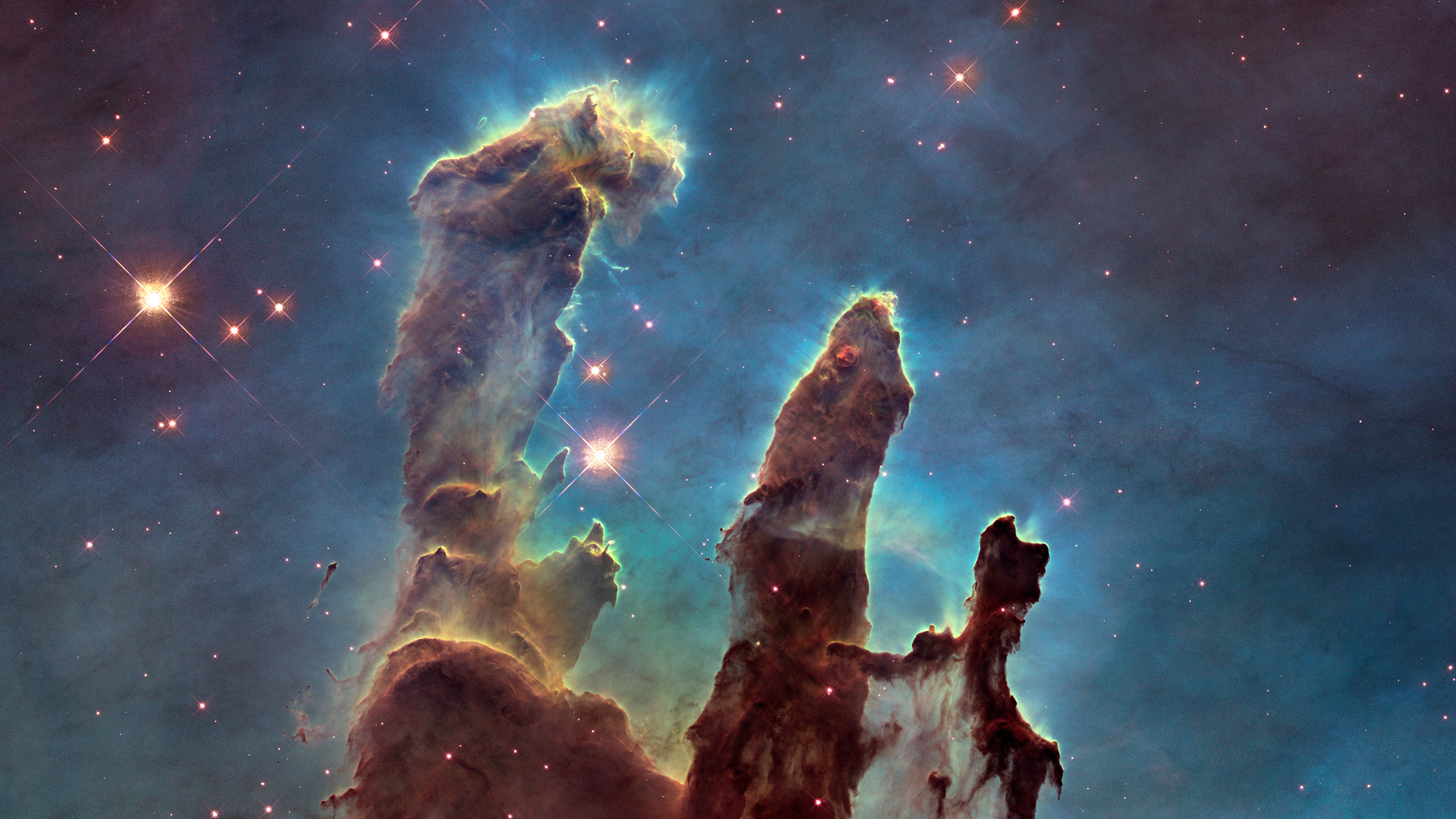 Pillars of Creation nebula in space with stars HD Wallpaper