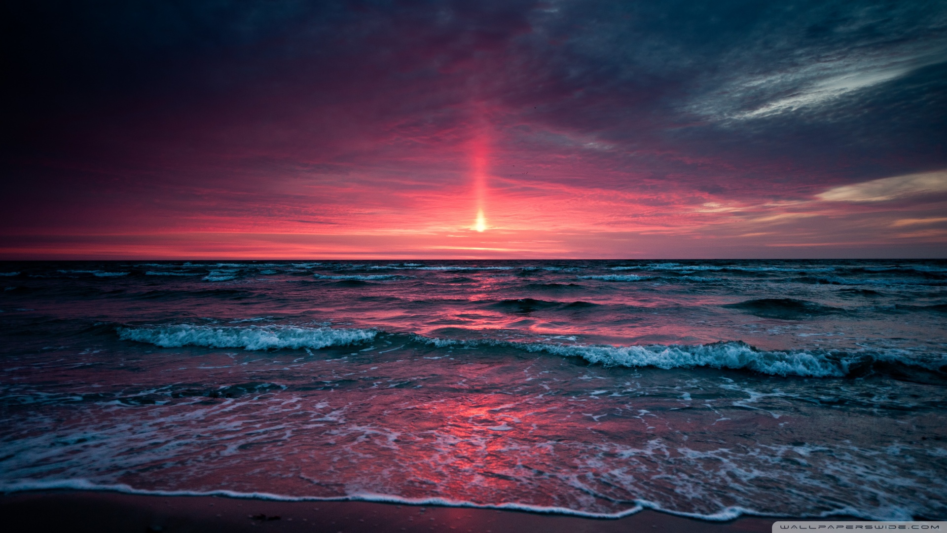 Sunset over the sea with dramatic sky HD Wallpaper