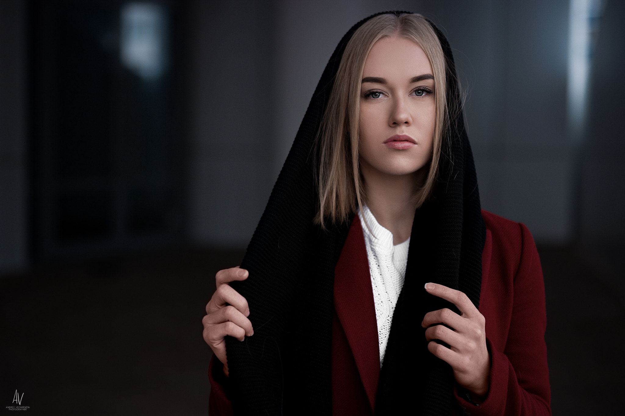 Woman with blonde hair wearing a black scarf and red jacket HD Wallpaper