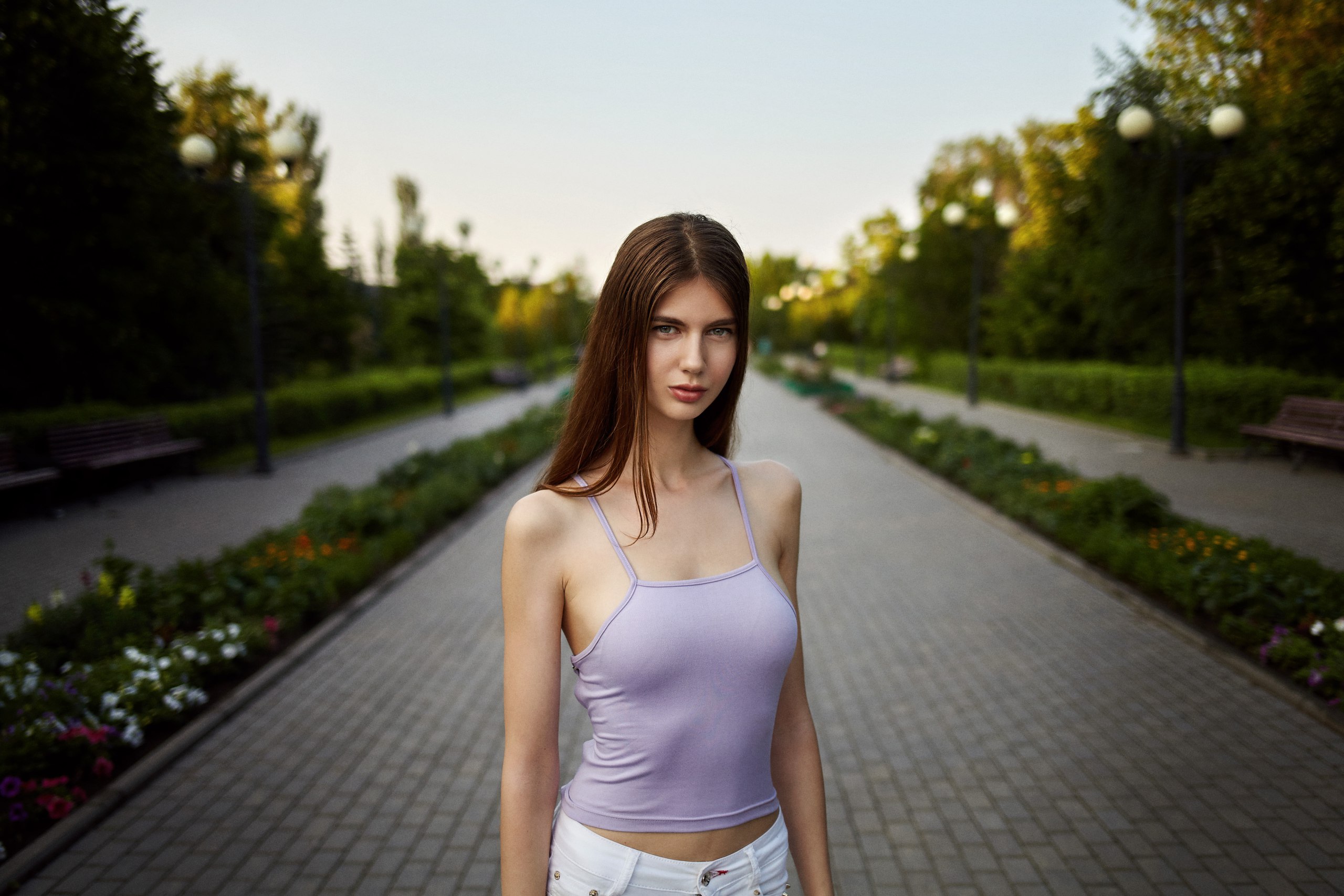 Woman in a park with flowers and trees HD Wallpaper