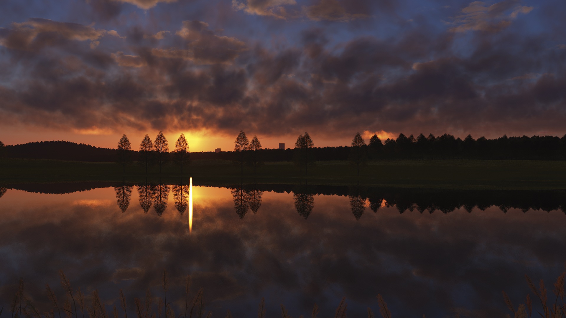 Sunset over a lake with reflections HD Wallpaper