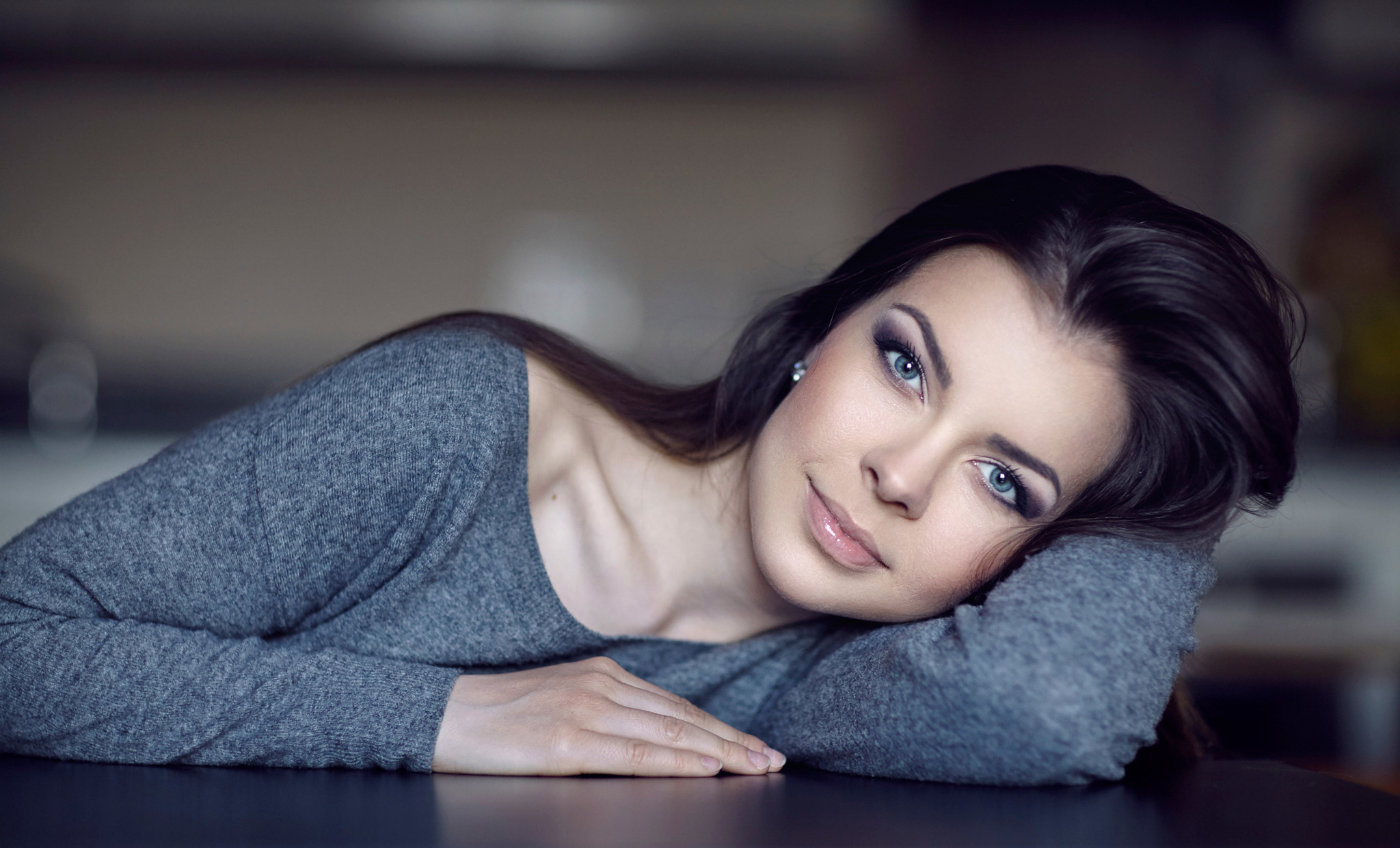 Woman with blue eyes and black hair HD Wallpaper