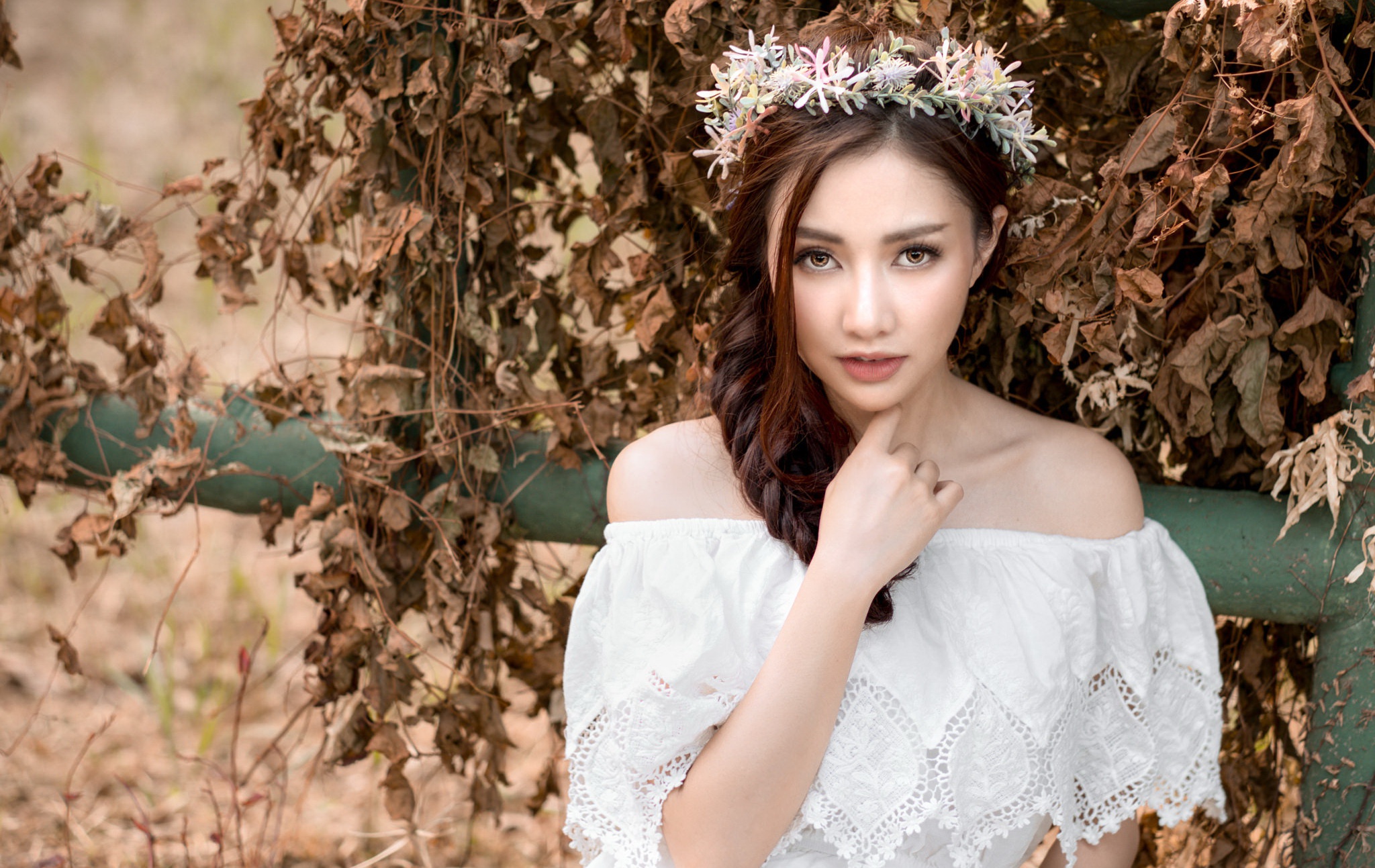 Woman with flower crown and white dress outdoors HD Wallpaper