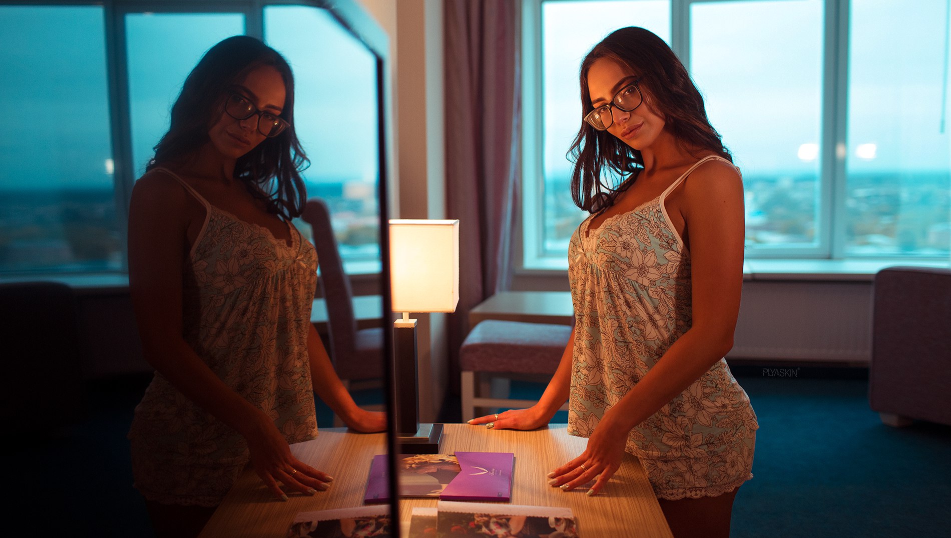 Woman with glasses in a room with a mirror HD Wallpaper