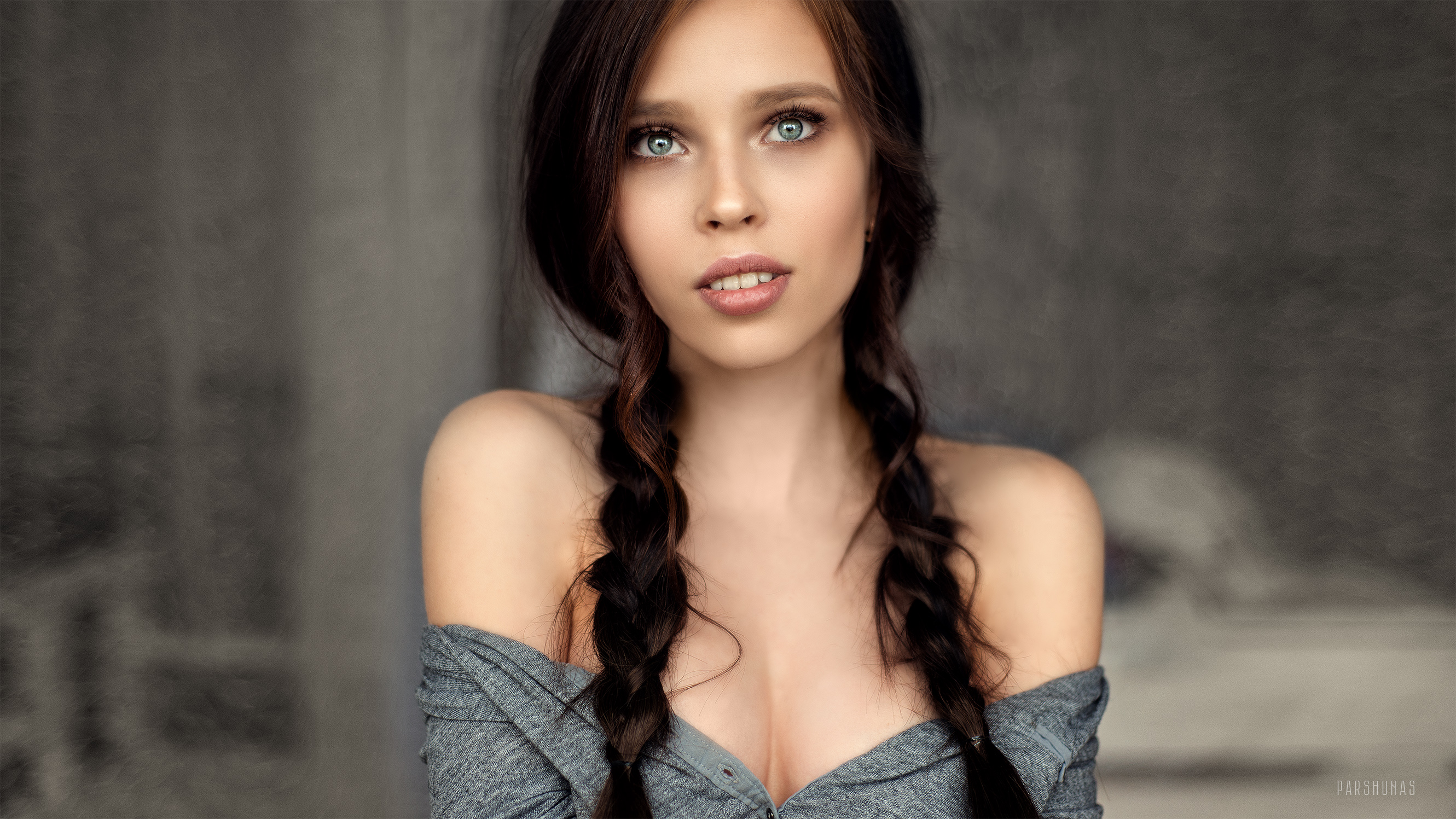 Woman with pigtails and cleavage HD Wallpaper