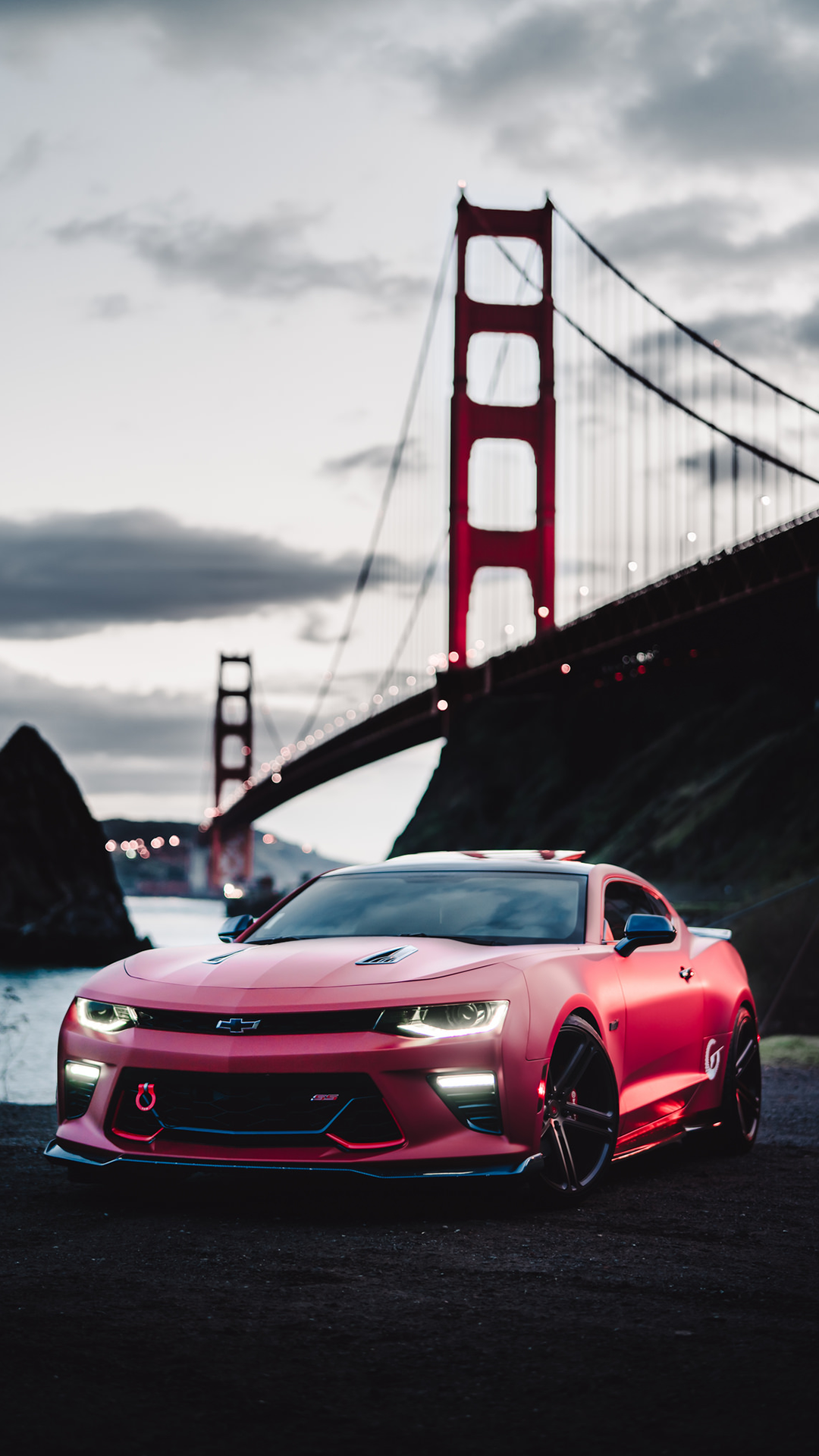 Red Chevrolet Camaro in front of Golden Gate Bridge HD Wallpaper