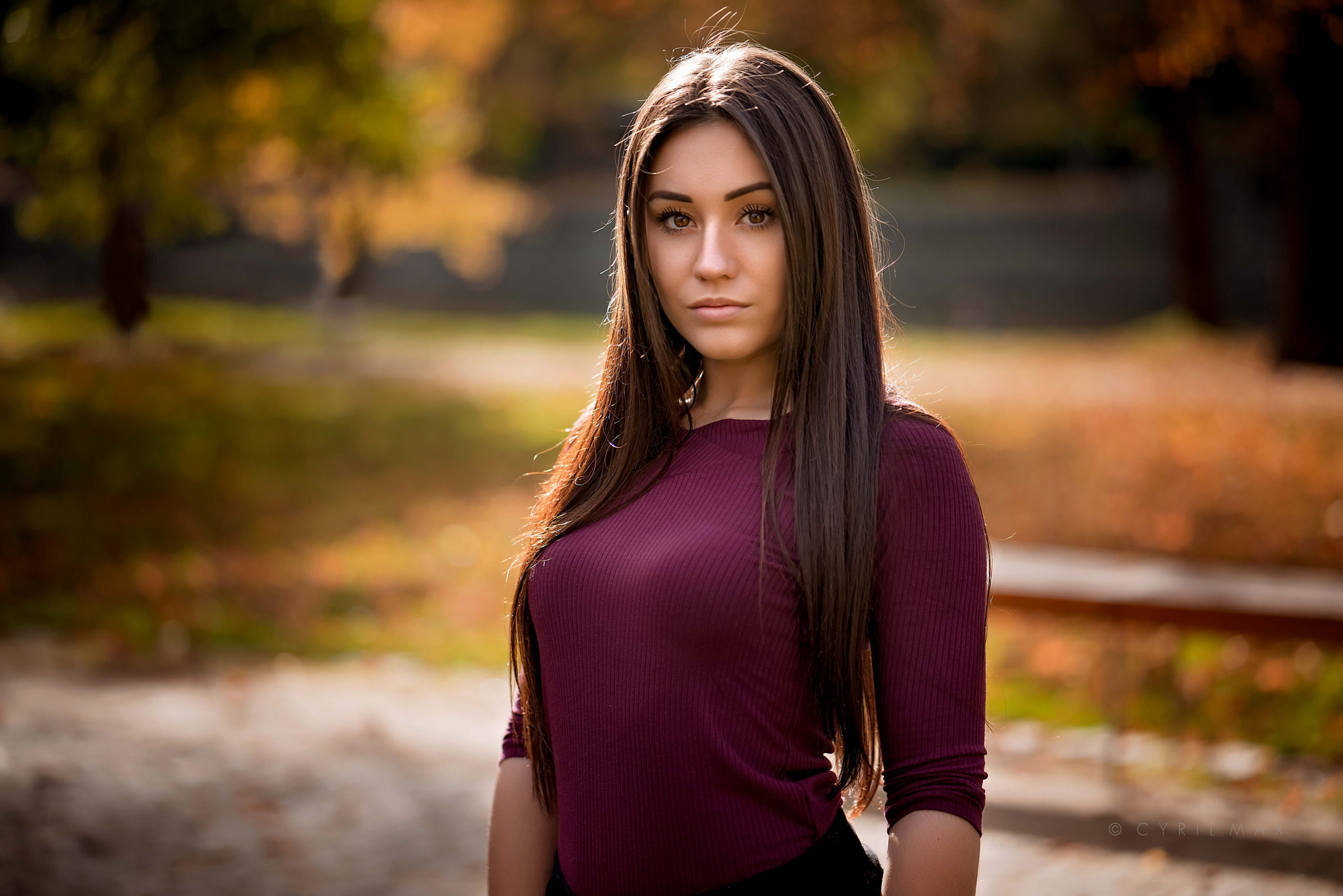 Woman in a maroon shirt outdoors HD Wallpaper