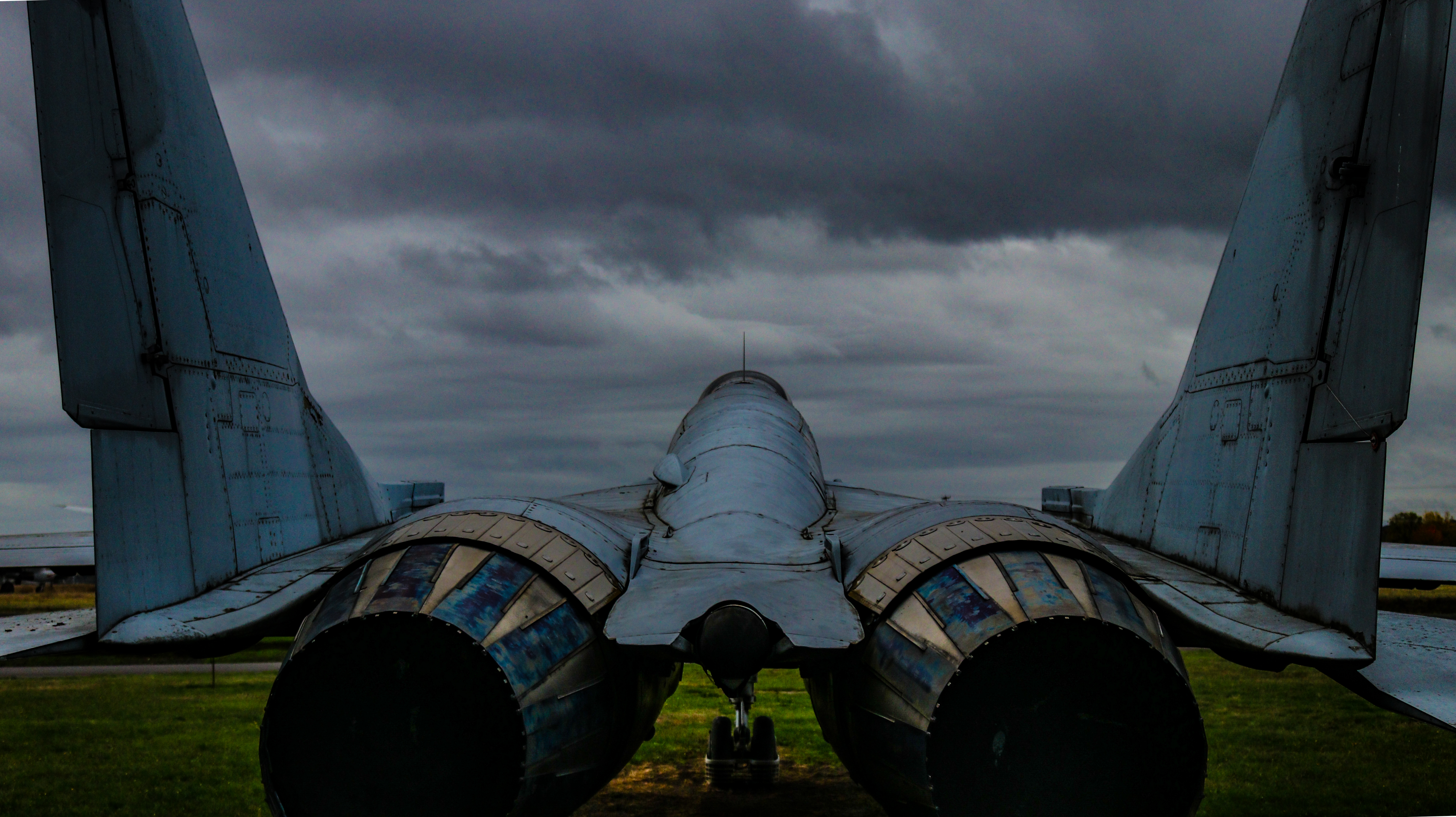 Rear view of a parked jet fighter aircraft HD Wallpaper