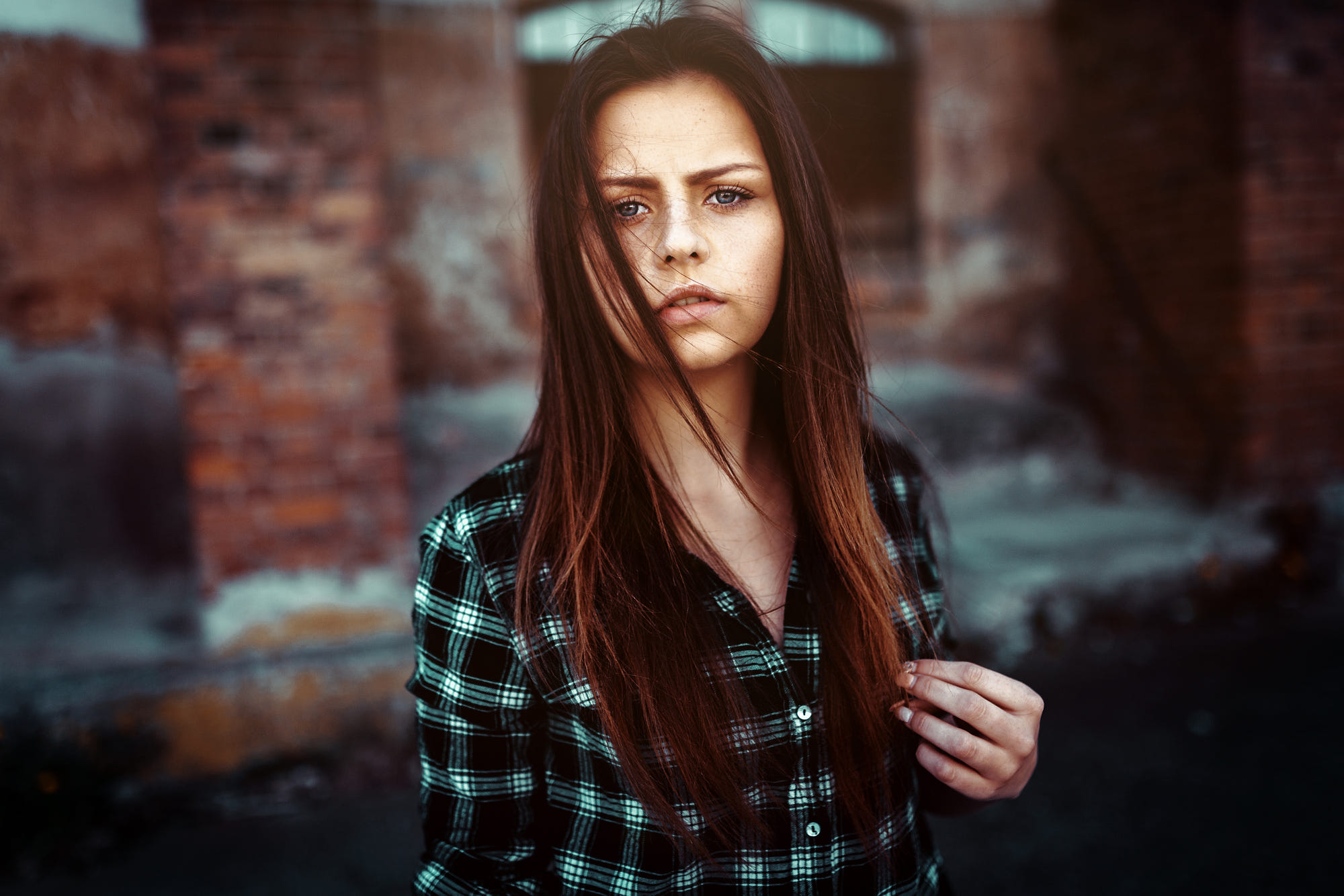 Young woman with blue eyes in a plaid shirt HD Wallpaper