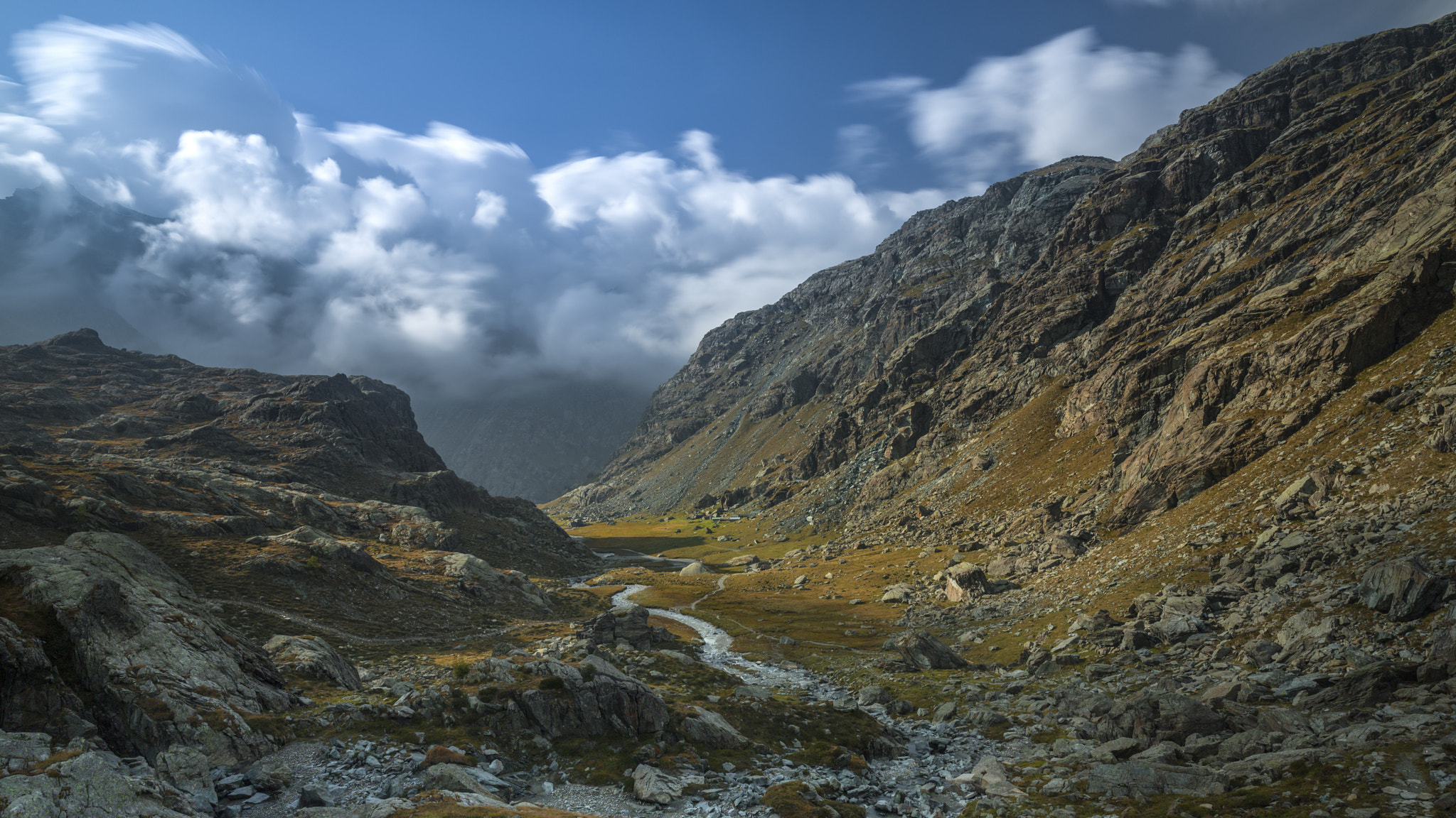 Mountain valley with a river and clouds HD Wallpaper