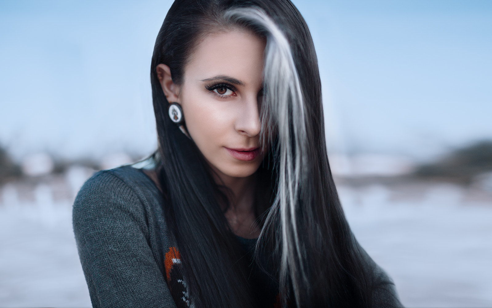 Woman with dark hair and white streak HD Wallpaper
