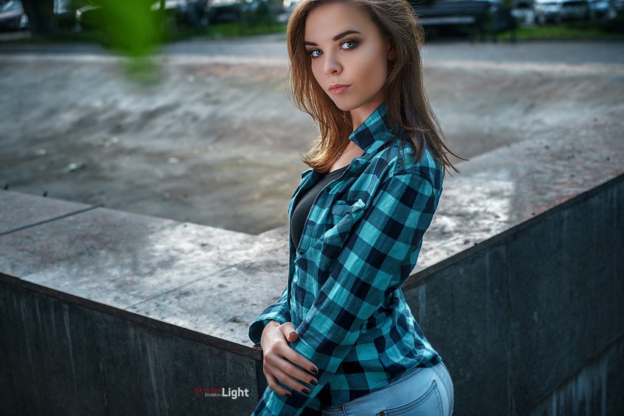 Woman in plaid shirt and jeans outdoors HD Wallpaper