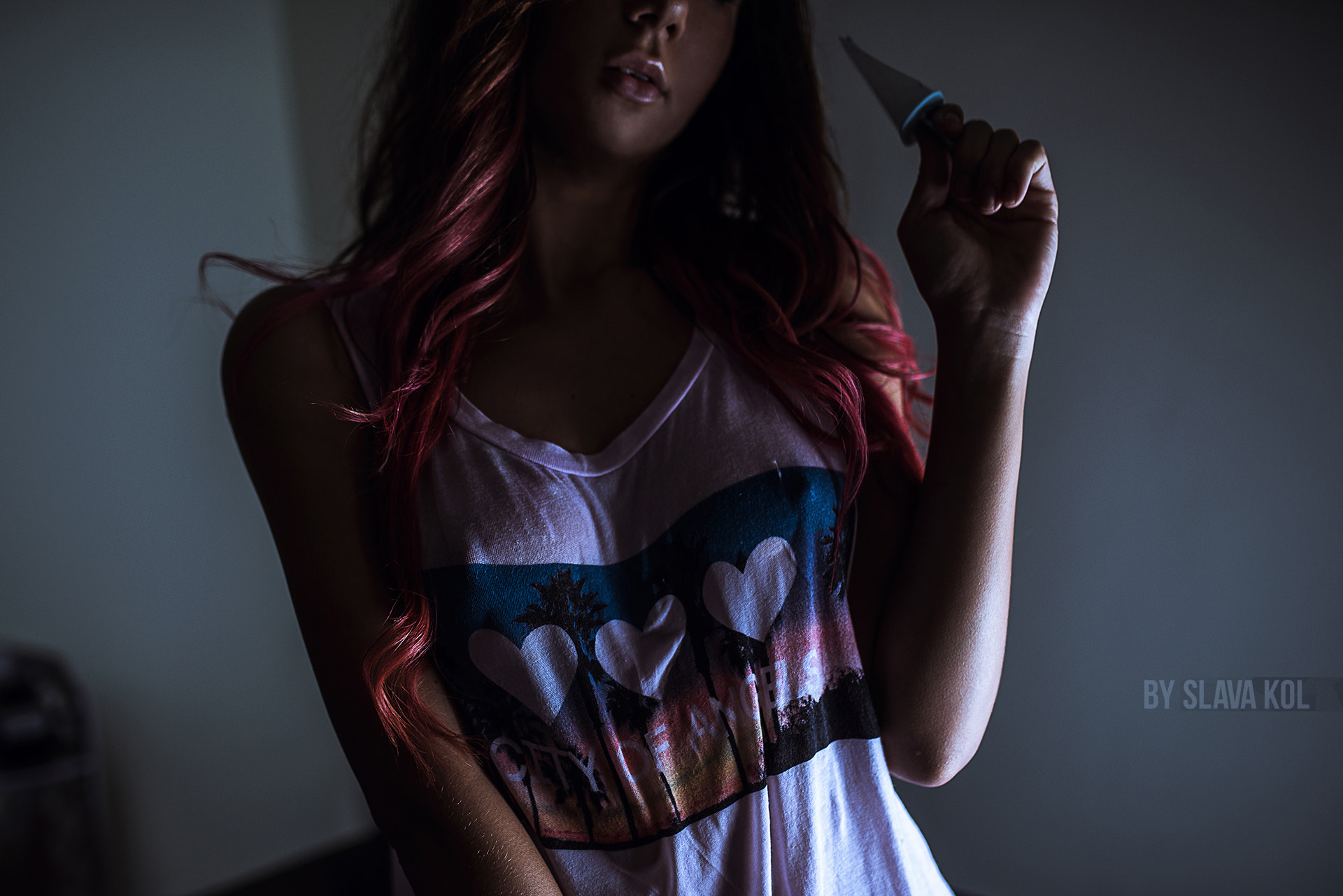 Woman with red hair holding a knife HD Wallpaper