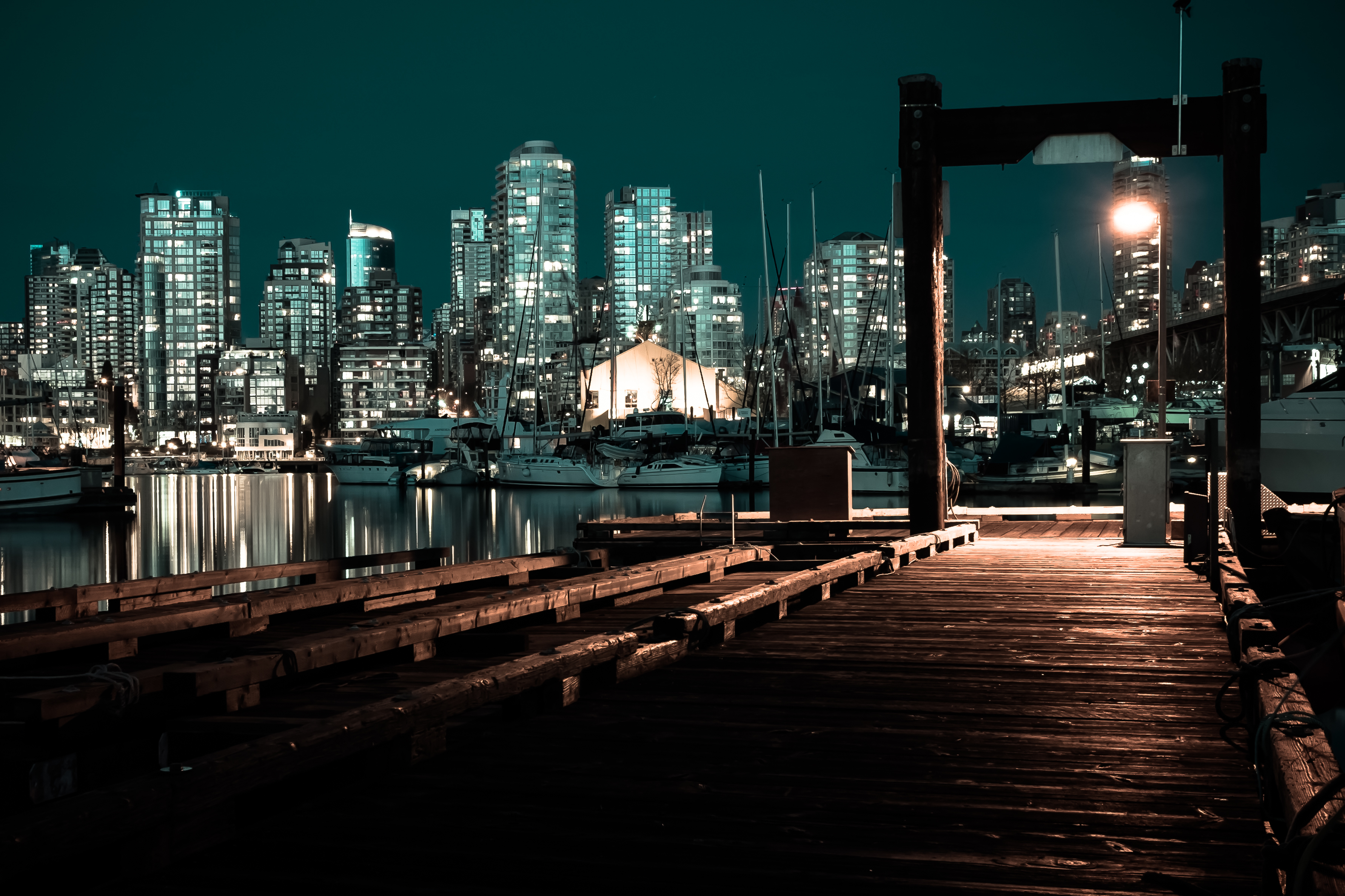 Night cityscape with pier and boats HD Wallpaper