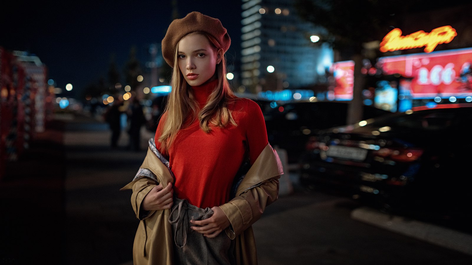 Woman in red turtleneck and beret at night HD Wallpaper