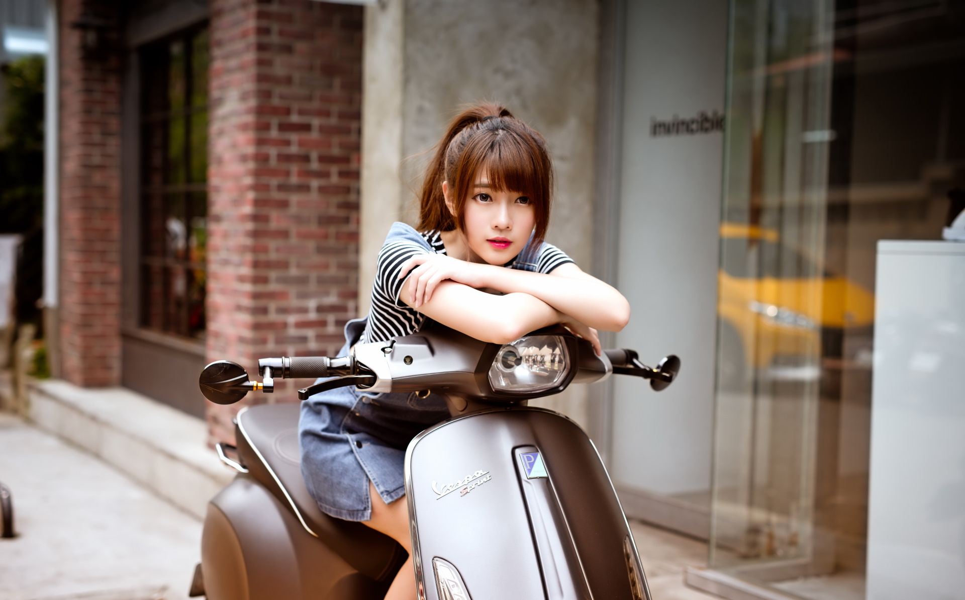 Young Asian woman on a Vespa scooter HD Wallpaper