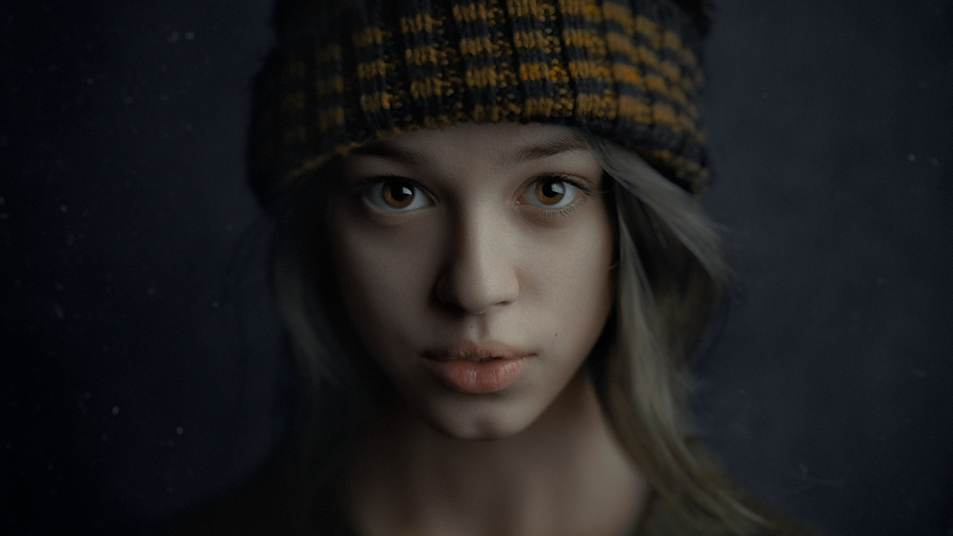 Portrait of a young girl with brown eyes wearing a beanie HD Wallpaper
