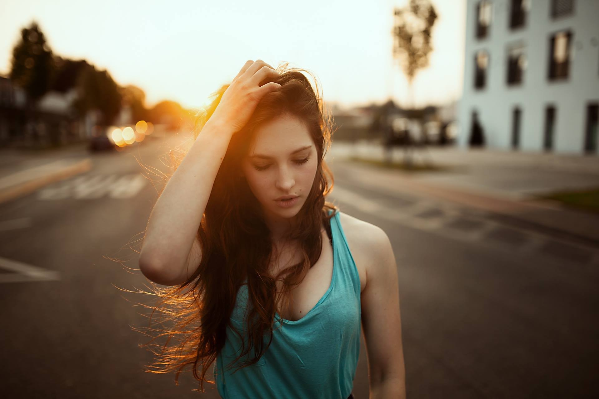 Janina Knopf in a teal tank top at sunset HD Wallpaper