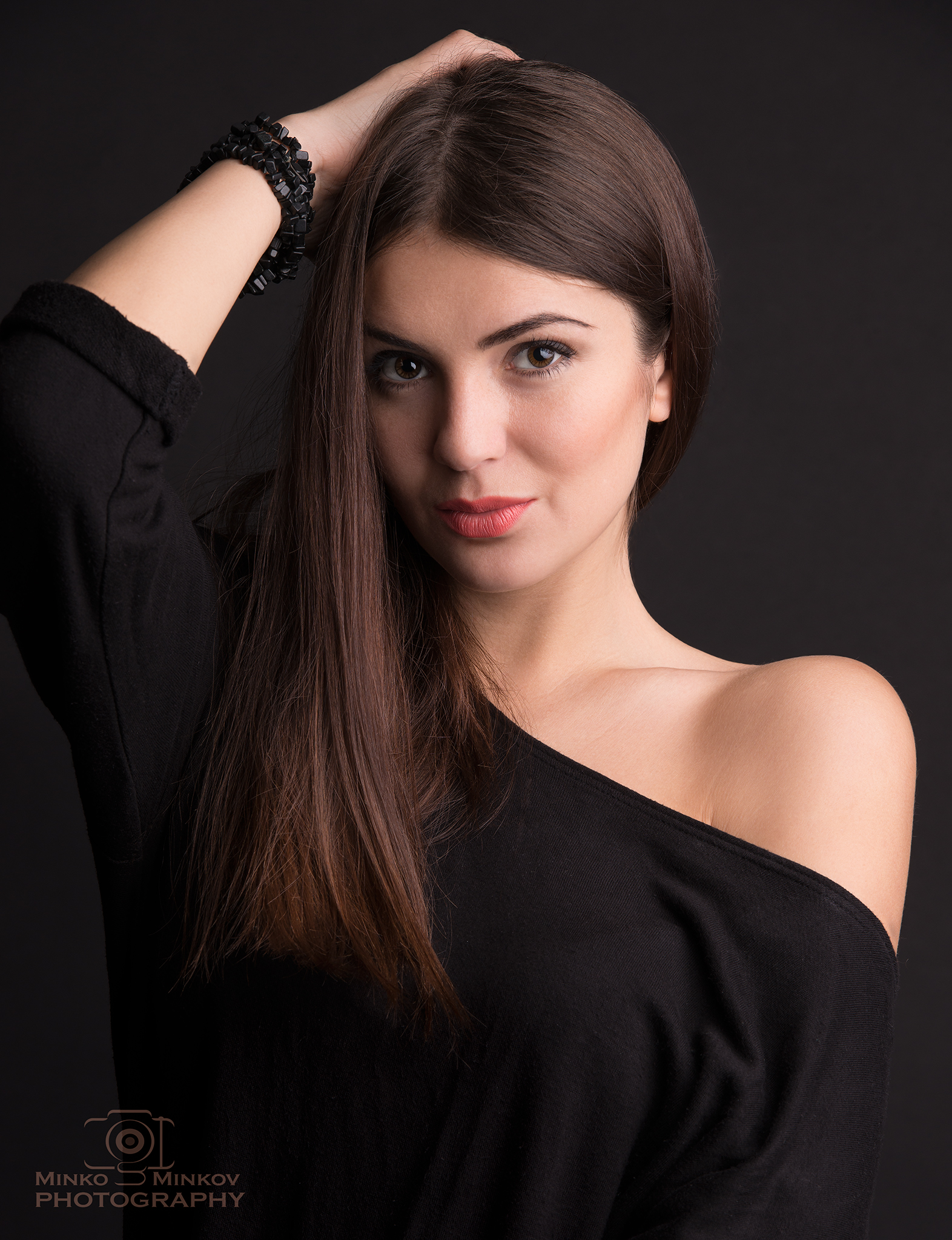 Brunette woman with bracelets in black dress HD Wallpaper