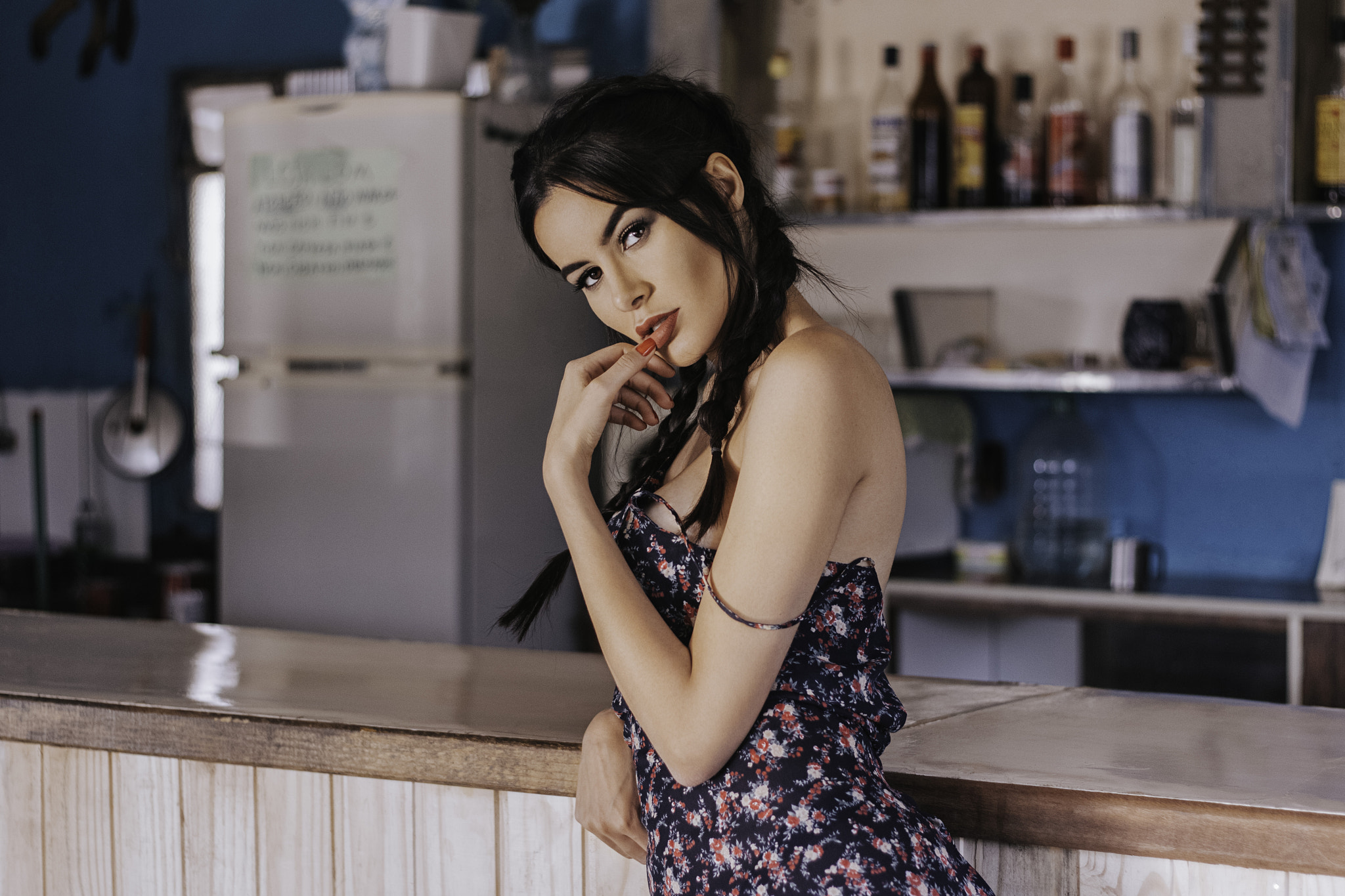 Woman with pigtails and red lipstick at a bar HD Wallpaper