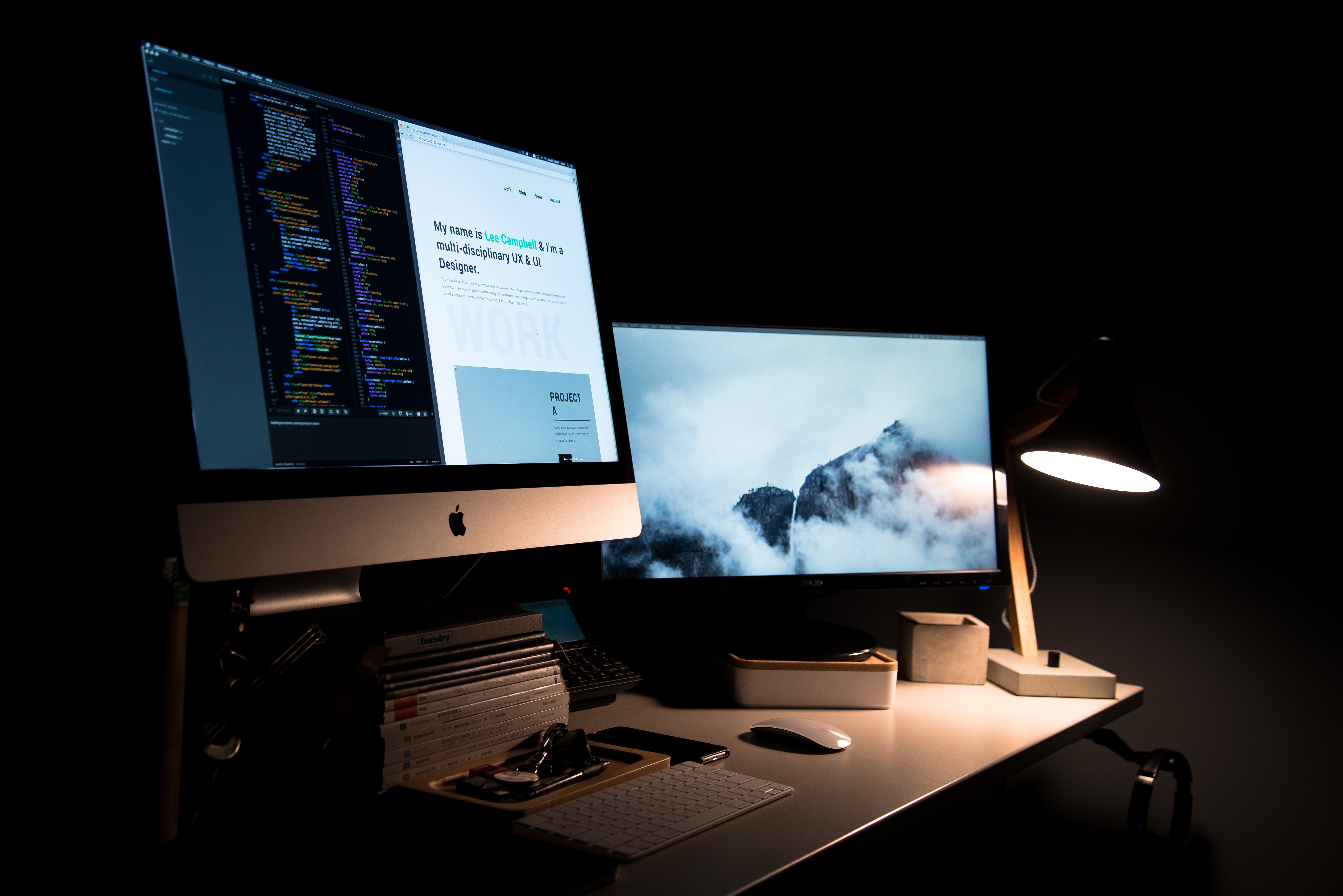Apple iMac computer setup with desk lamp and books HD Wallpaper