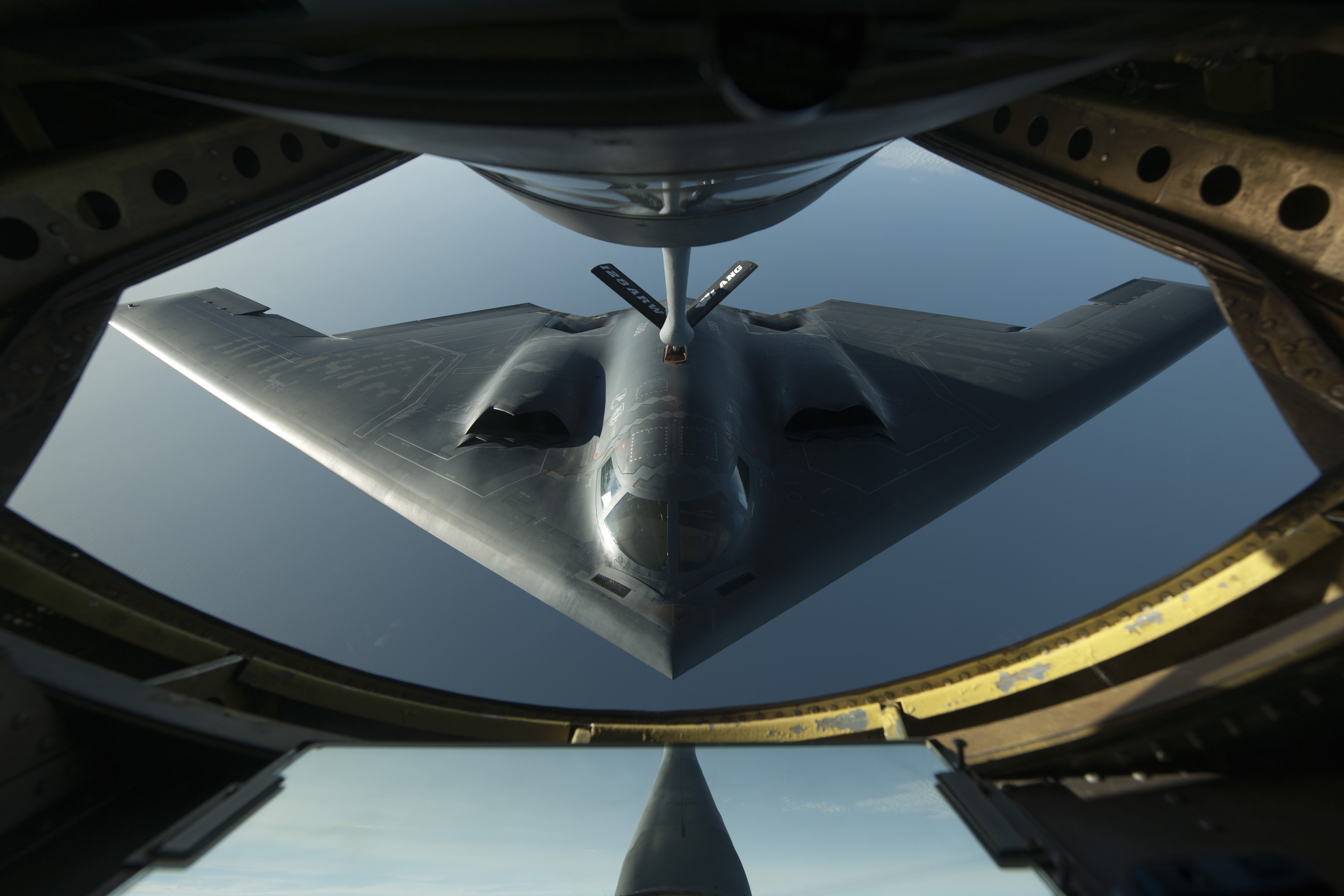 B-2 Spirit refueling from a KC-135 Stratotanker HD Wallpaper