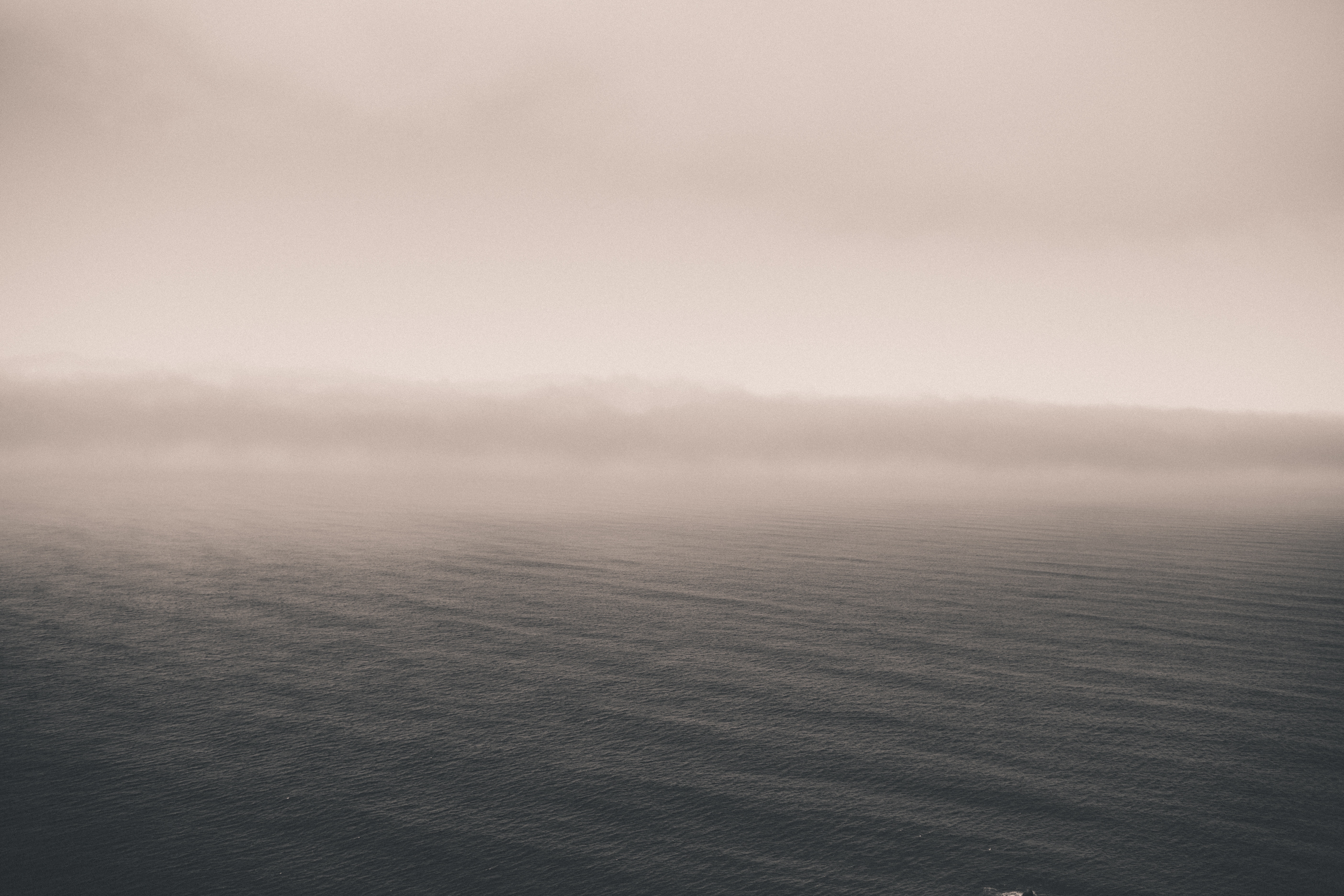 Ocean and fog over water HD Wallpaper