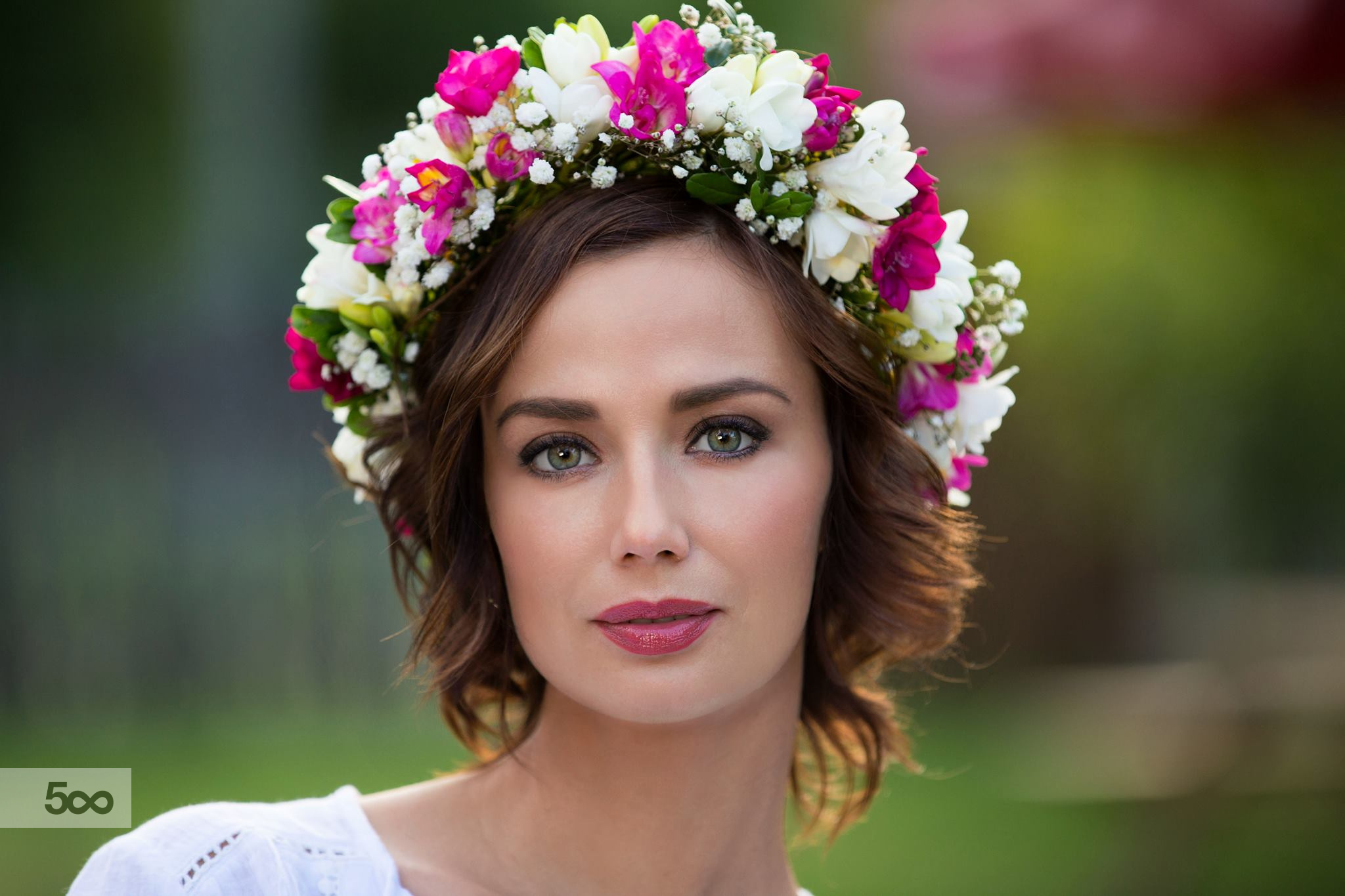 Woman with flower crown in nature HD Wallpaper