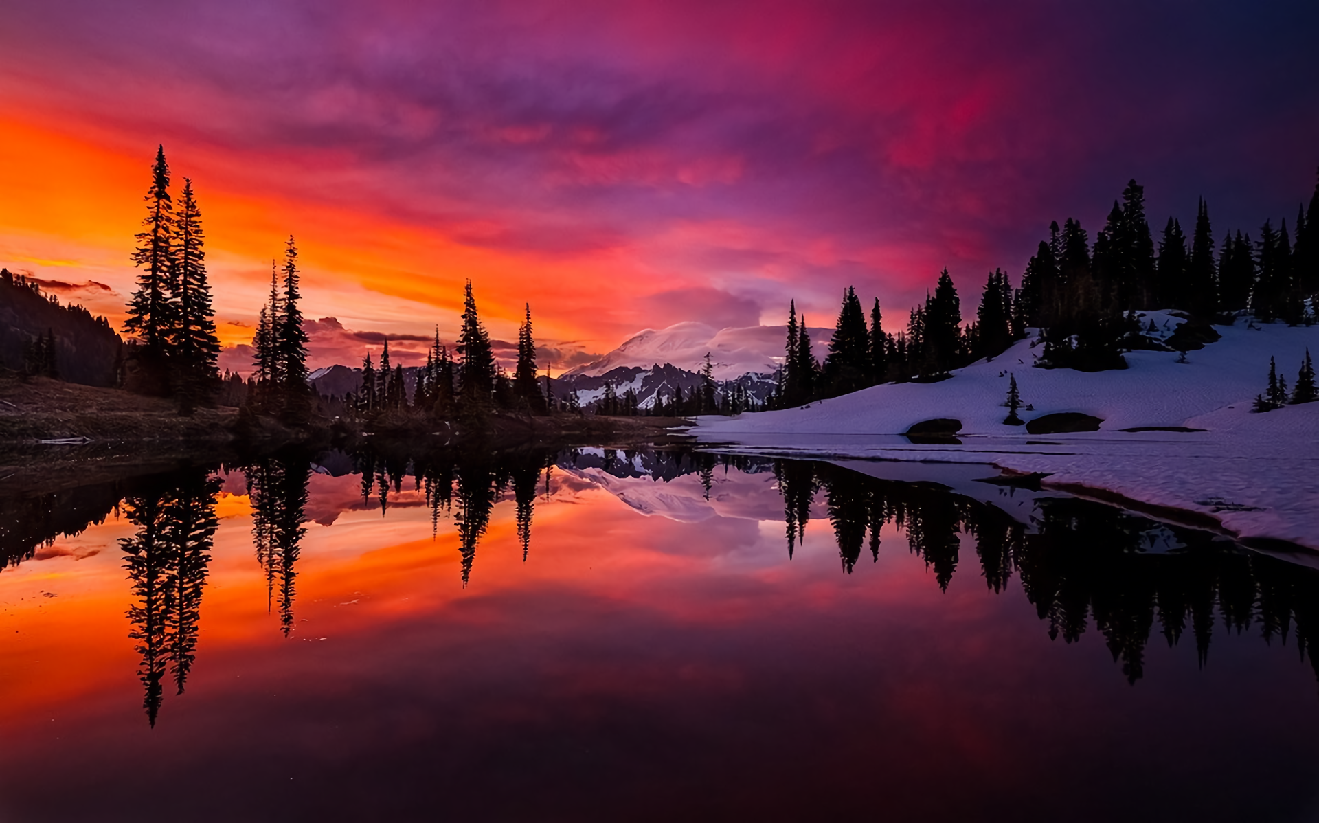 Mountain lake at sunset with colorful sky and reflections HD Wallpaper