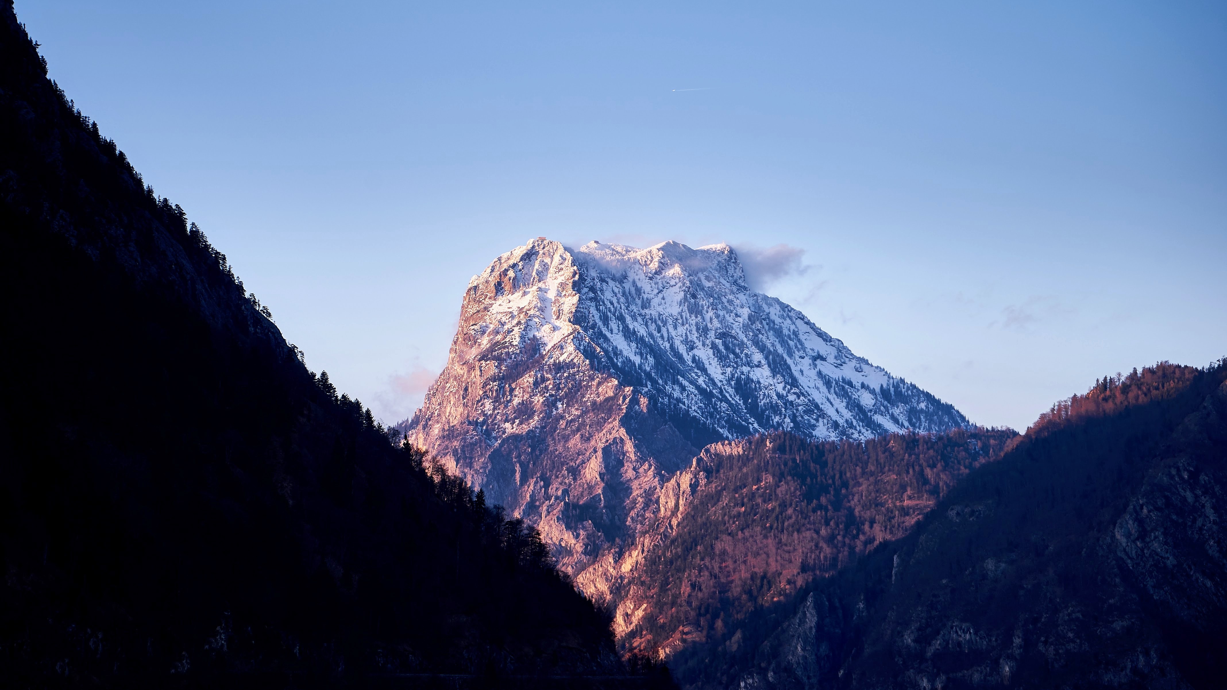 Snow-capped mountain peak at sunset HD Wallpaper