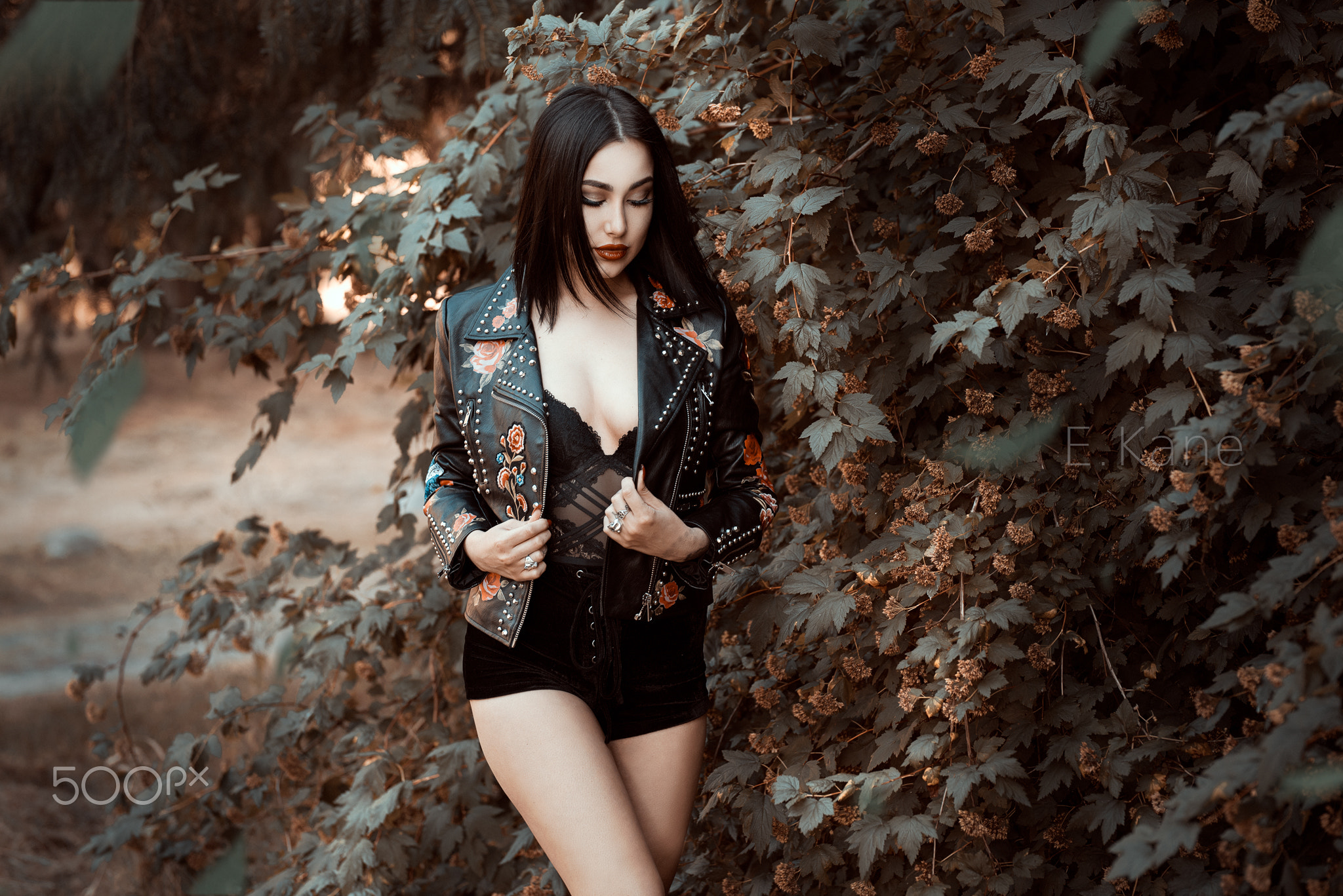 Woman in leather jacket with floral embroidery HD Wallpaper
