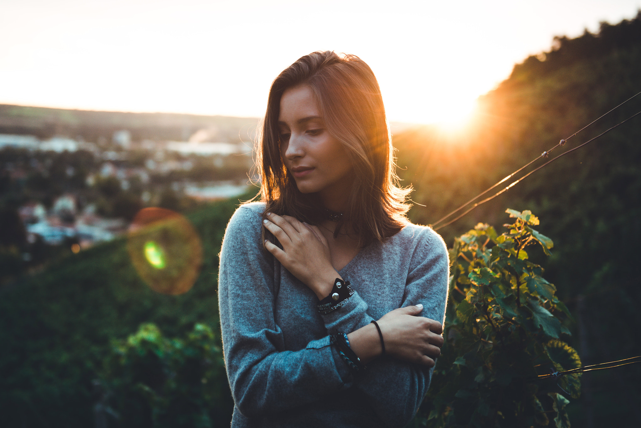 Woman in sweater at sunset HD Wallpaper