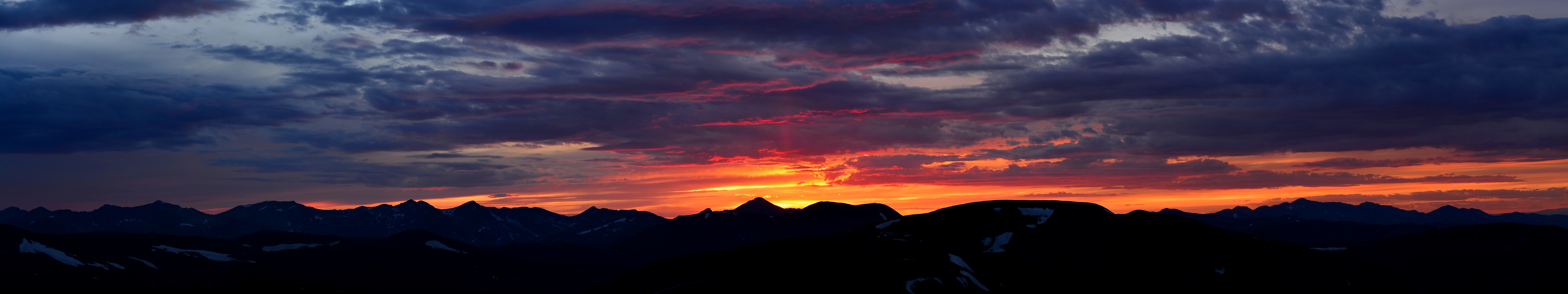 Sunset over dark mountains HD Wallpaper