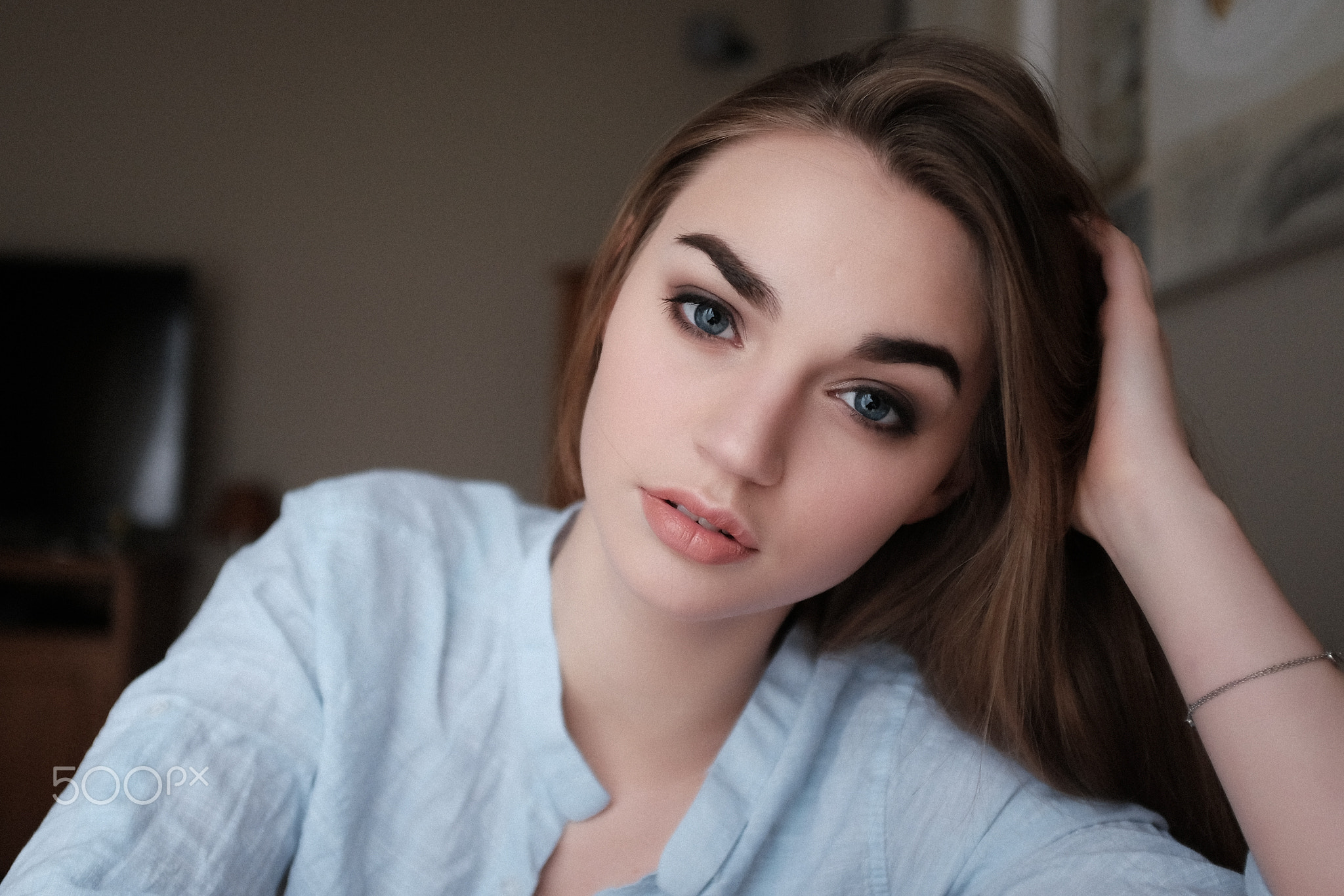 Portrait of a young woman with blue eyes HD Wallpaper