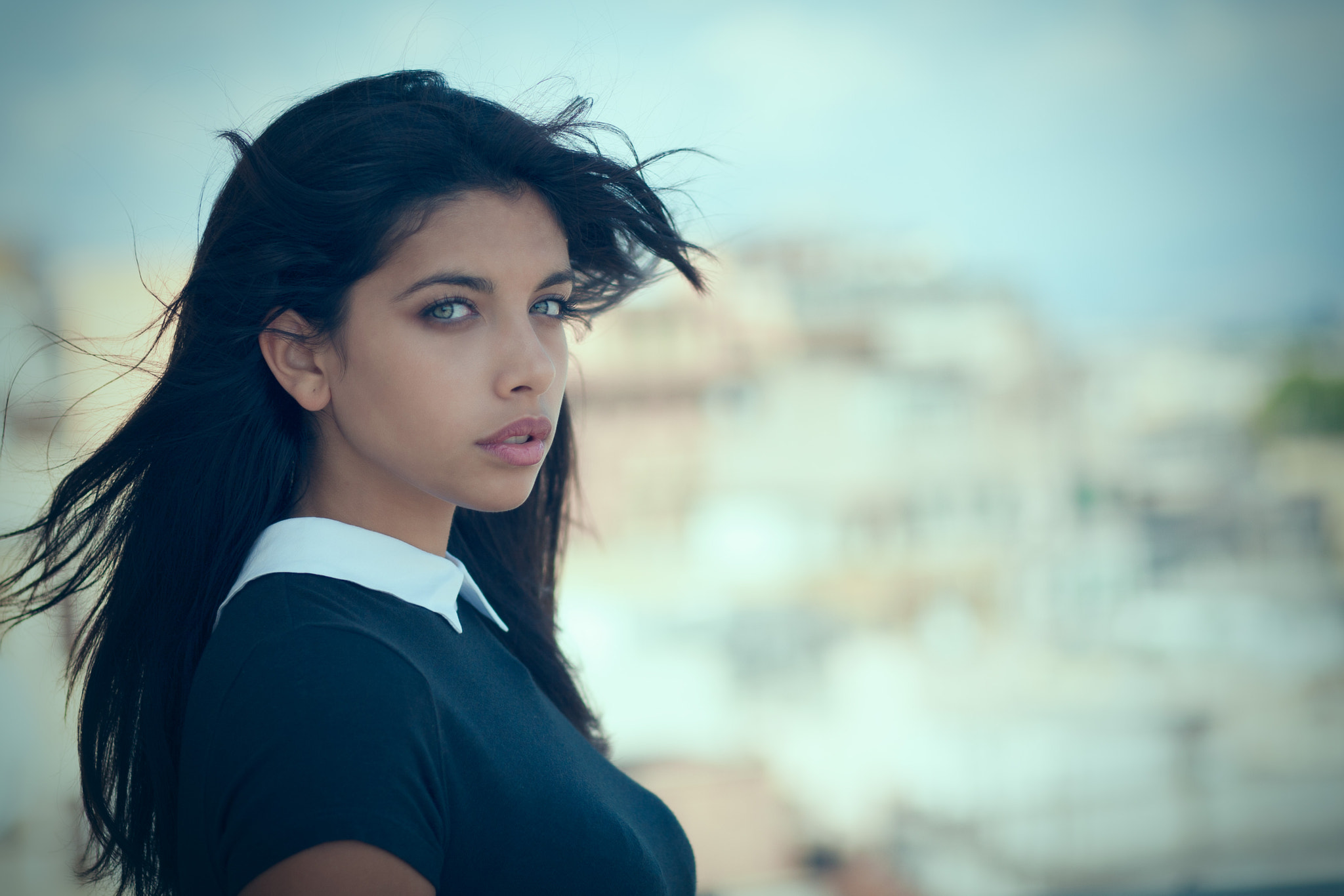 Portrait of a woman with dark hair and blue eyes HD Wallpaper