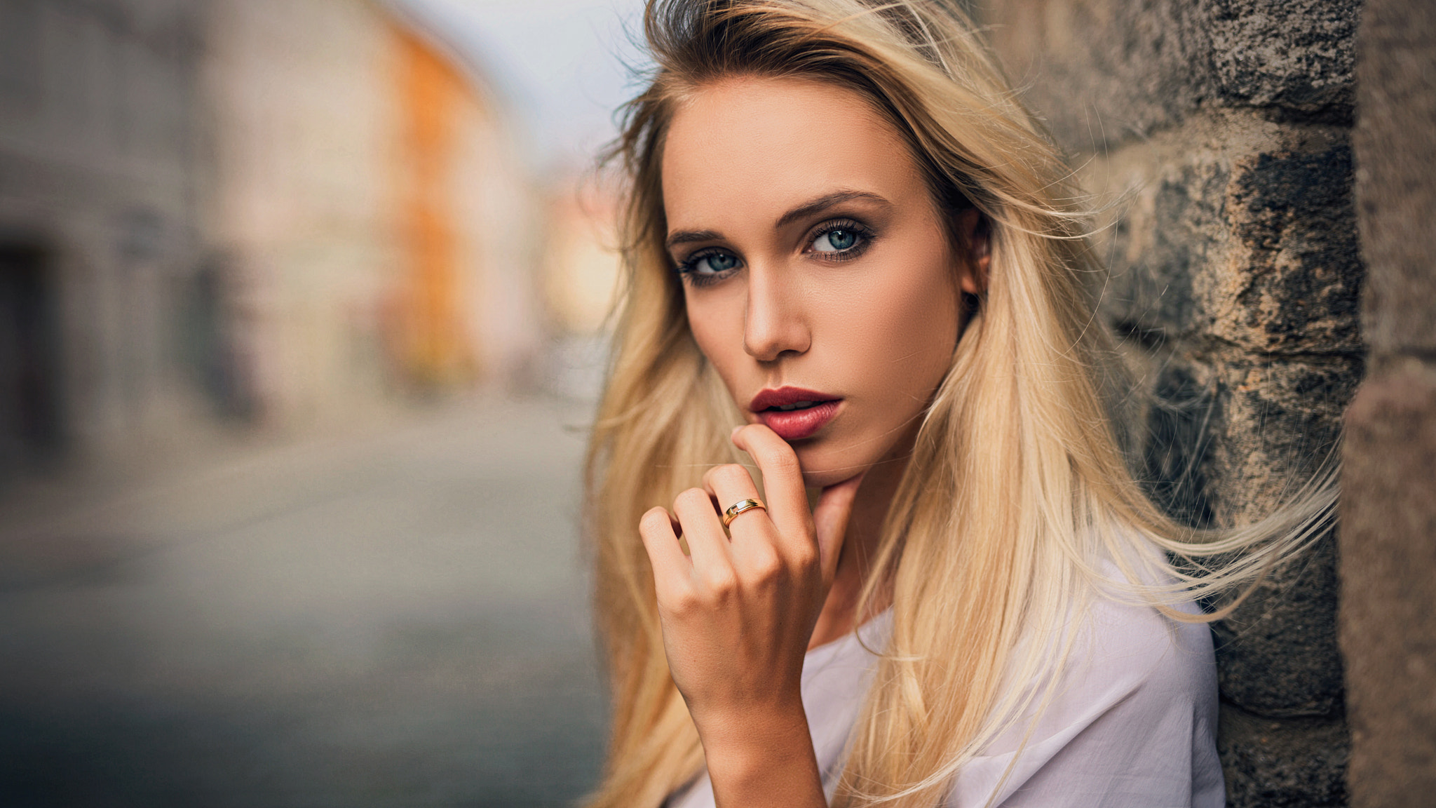 Portrait of a blonde woman with a ring HD Wallpaper