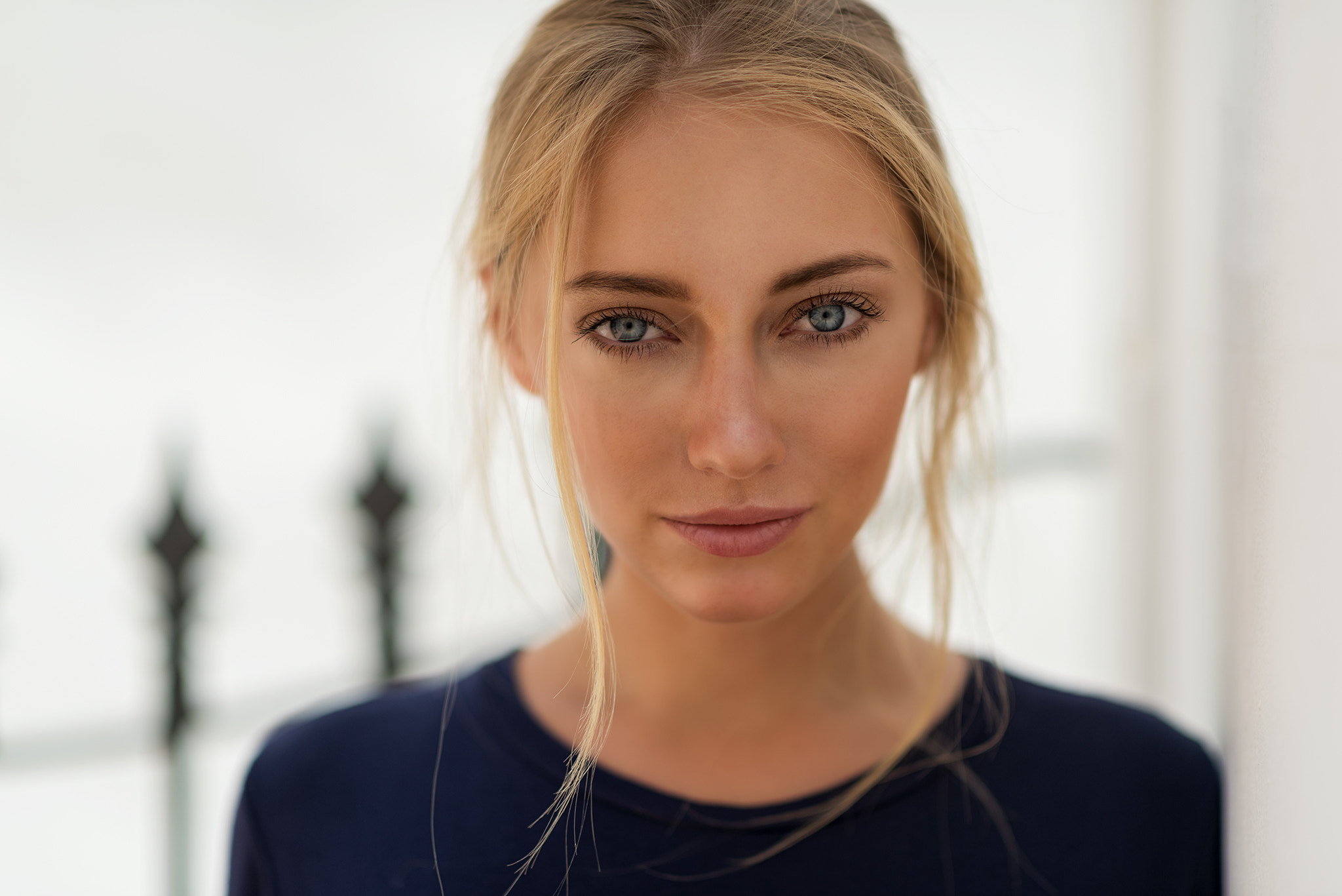 Portrait of a blonde woman with blue eyes HD Wallpaper