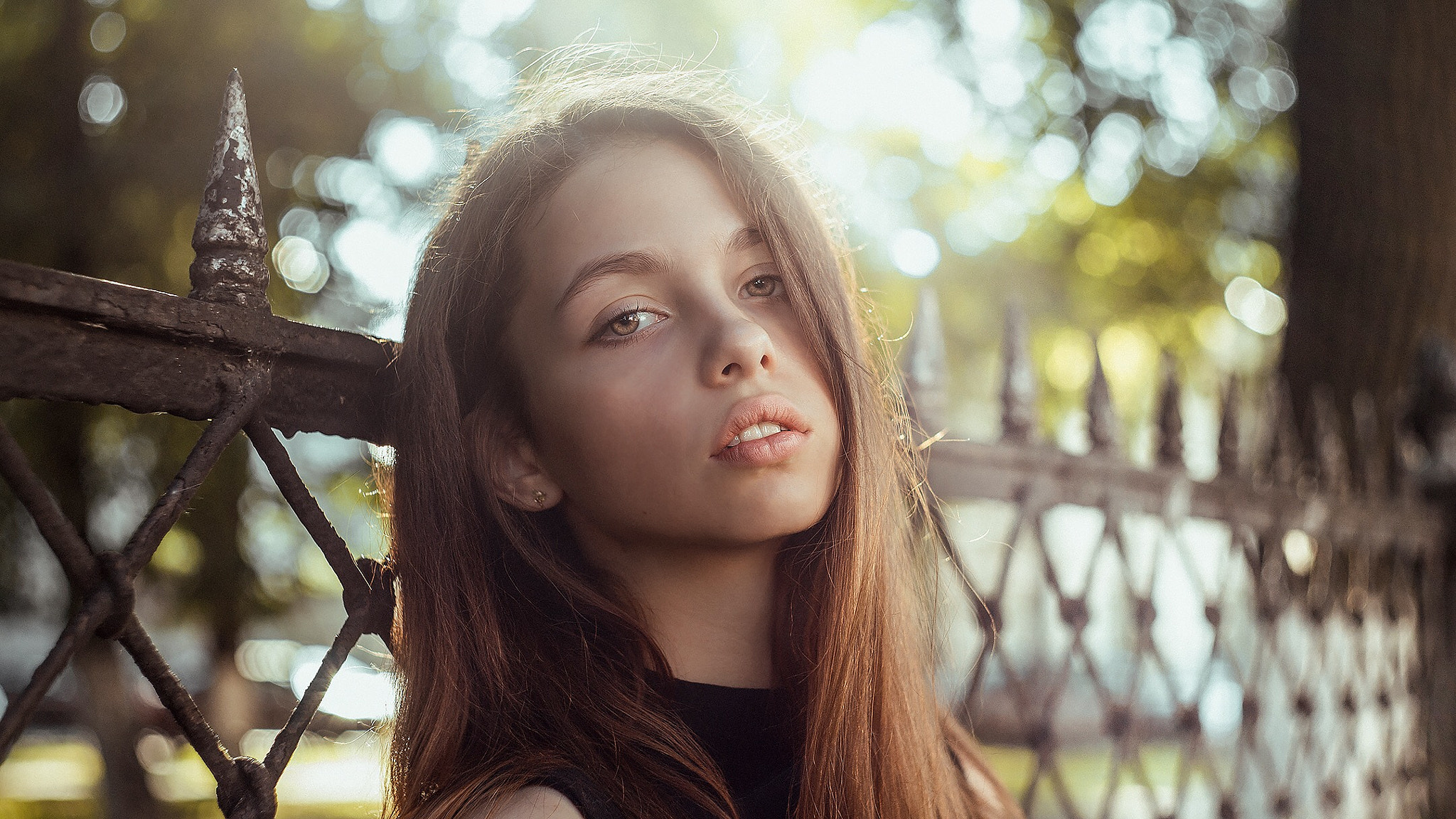 Lia Meyer portrait by a fence HD Wallpaper