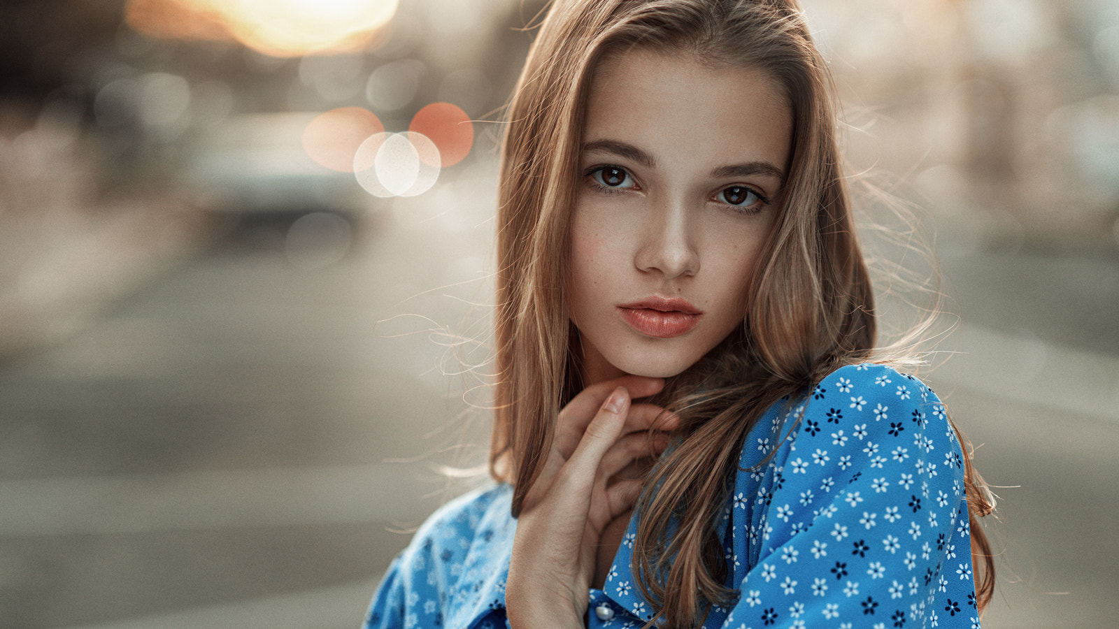 Portrait of a young woman with brown eyes and blonde hair HD Wallpaper