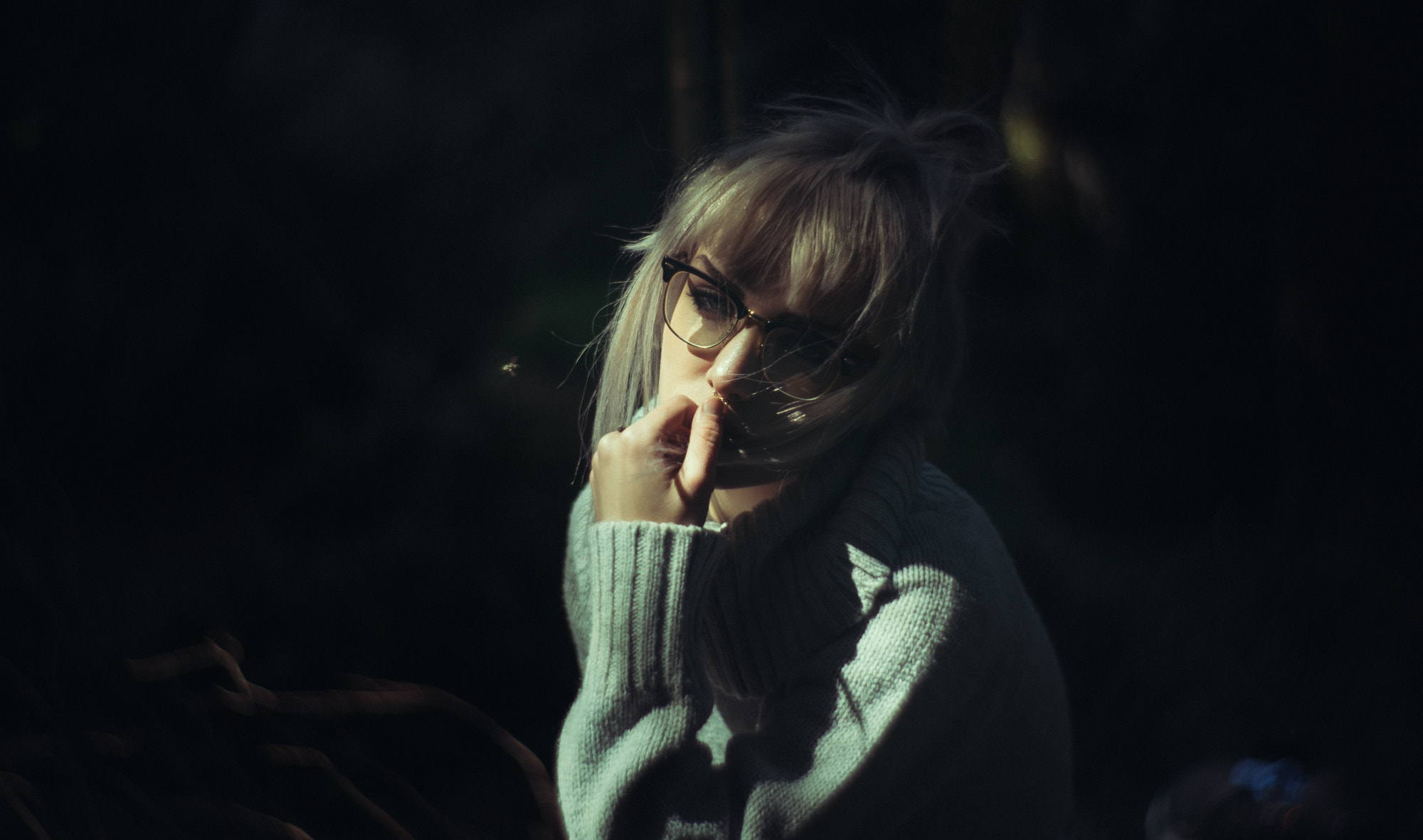Woman with glasses in a grey sweater HD Wallpaper