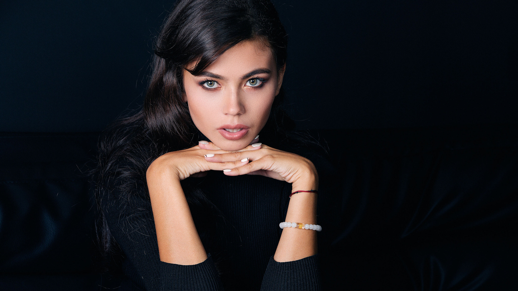 Woman with dark hair and bracelets HD Wallpaper