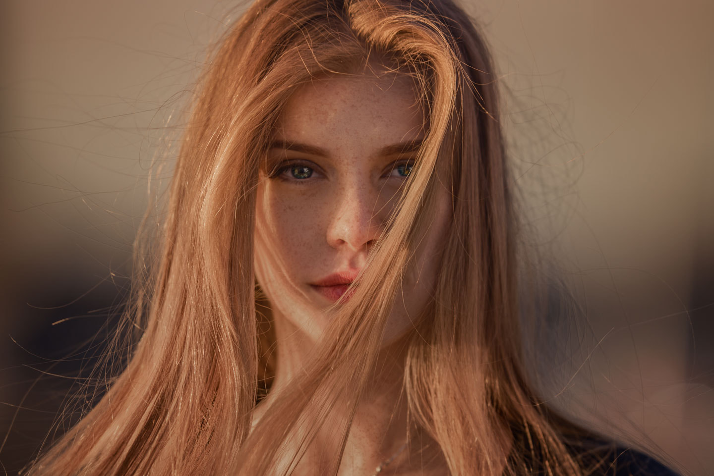 Portrait of a young woman with freckles and blonde hair HD Wallpaper