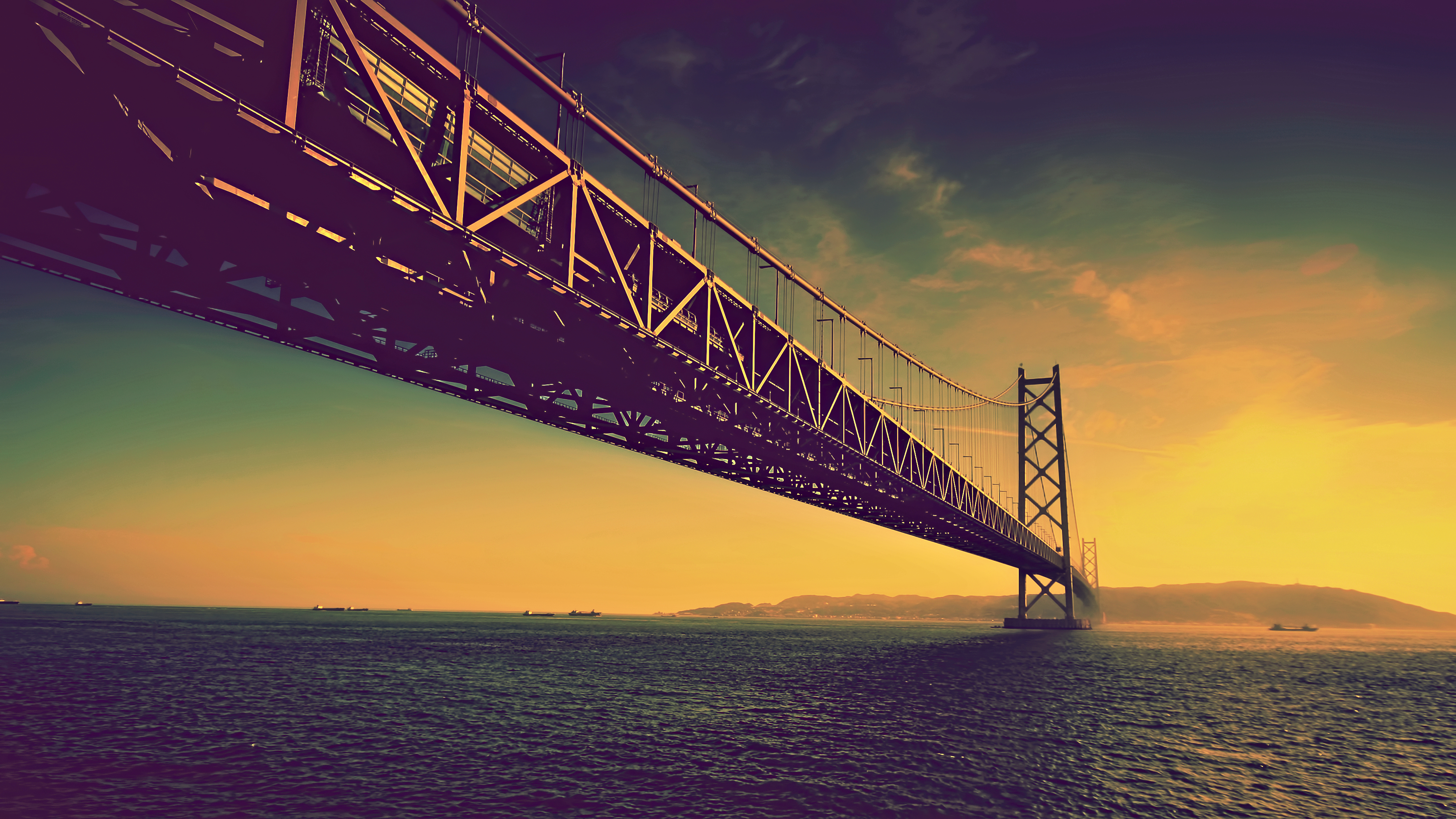 Akashi Kaikyo Bridge over the sea at sunset HD Wallpaper