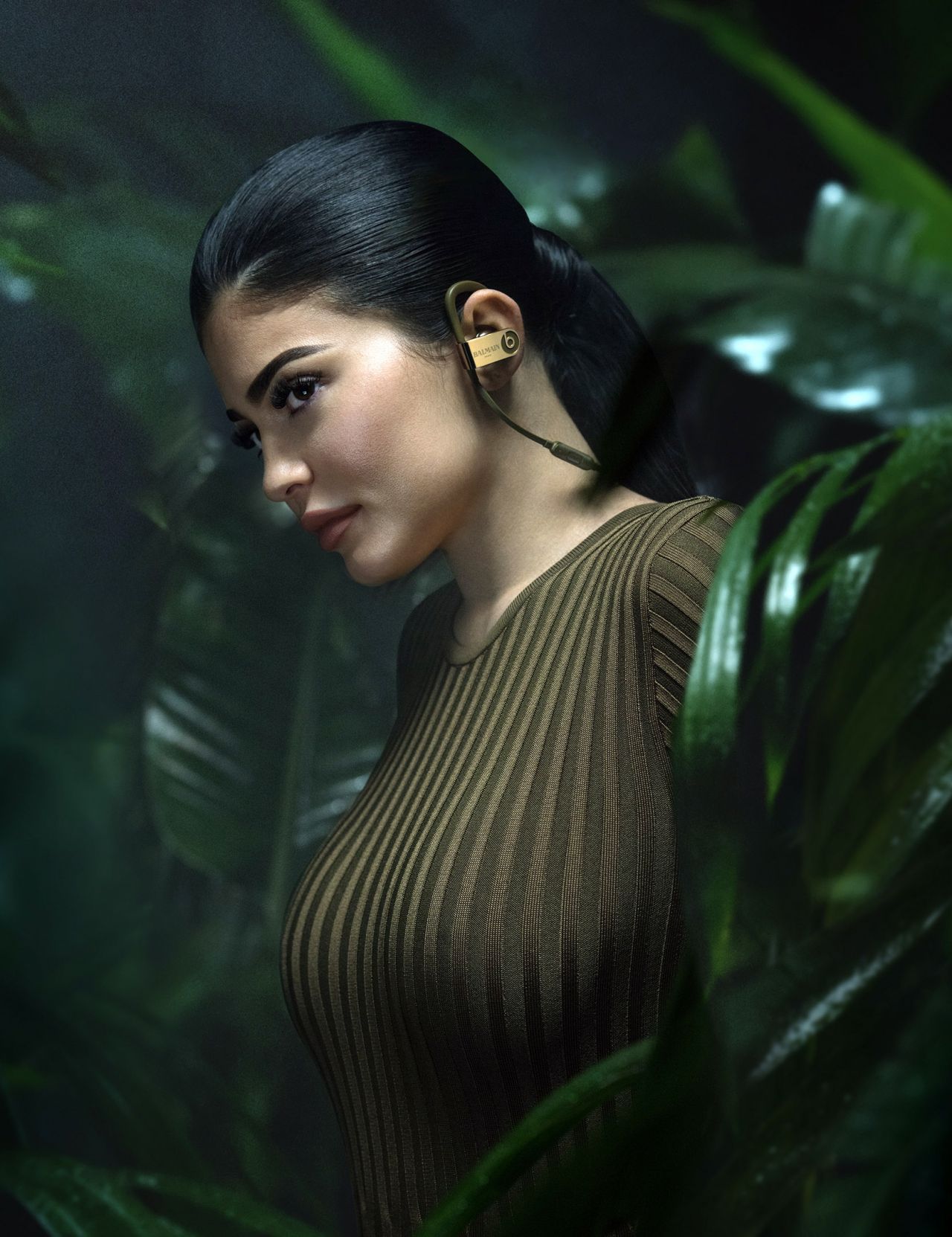 Kylie Jenner wearing Balmain Beats headphones HD Wallpaper