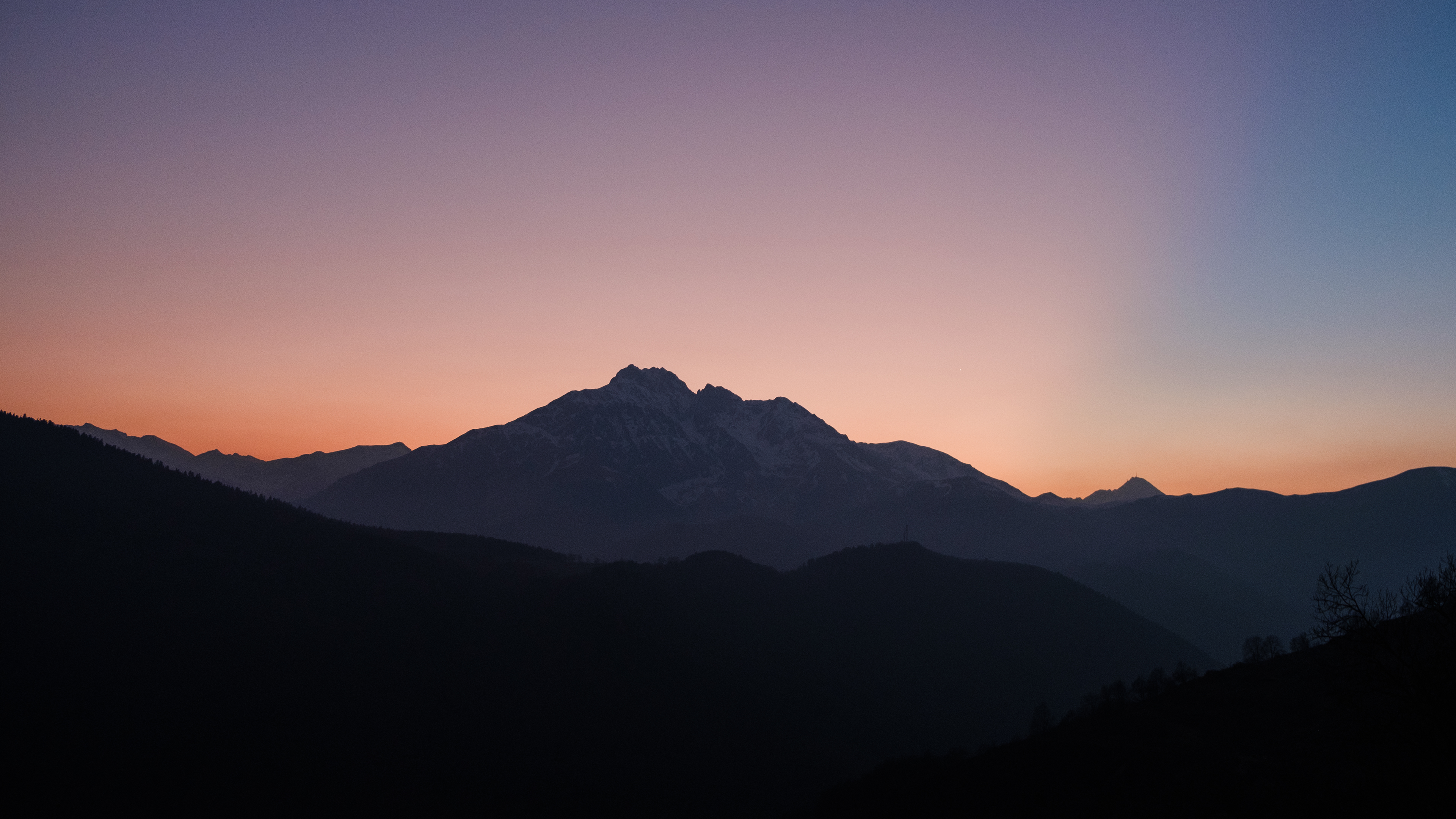 Mountain range at sunset with gradient sky HD Wallpaper
