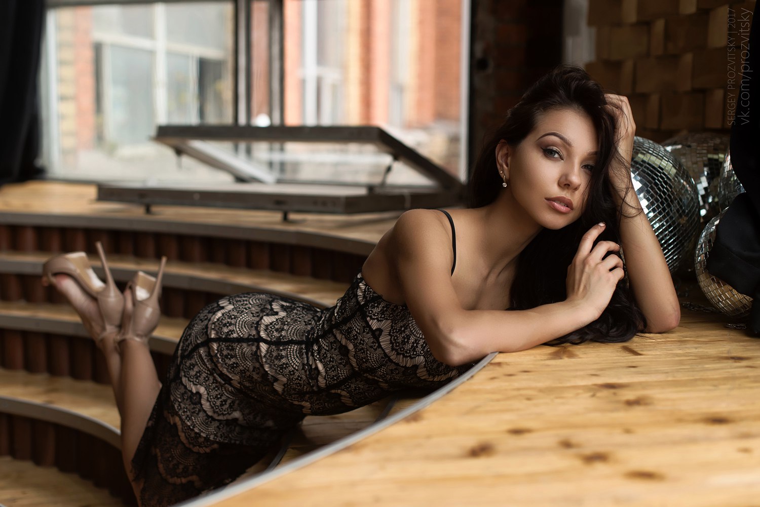 Woman in black lace dress and high heels kneeling HD Wallpaper