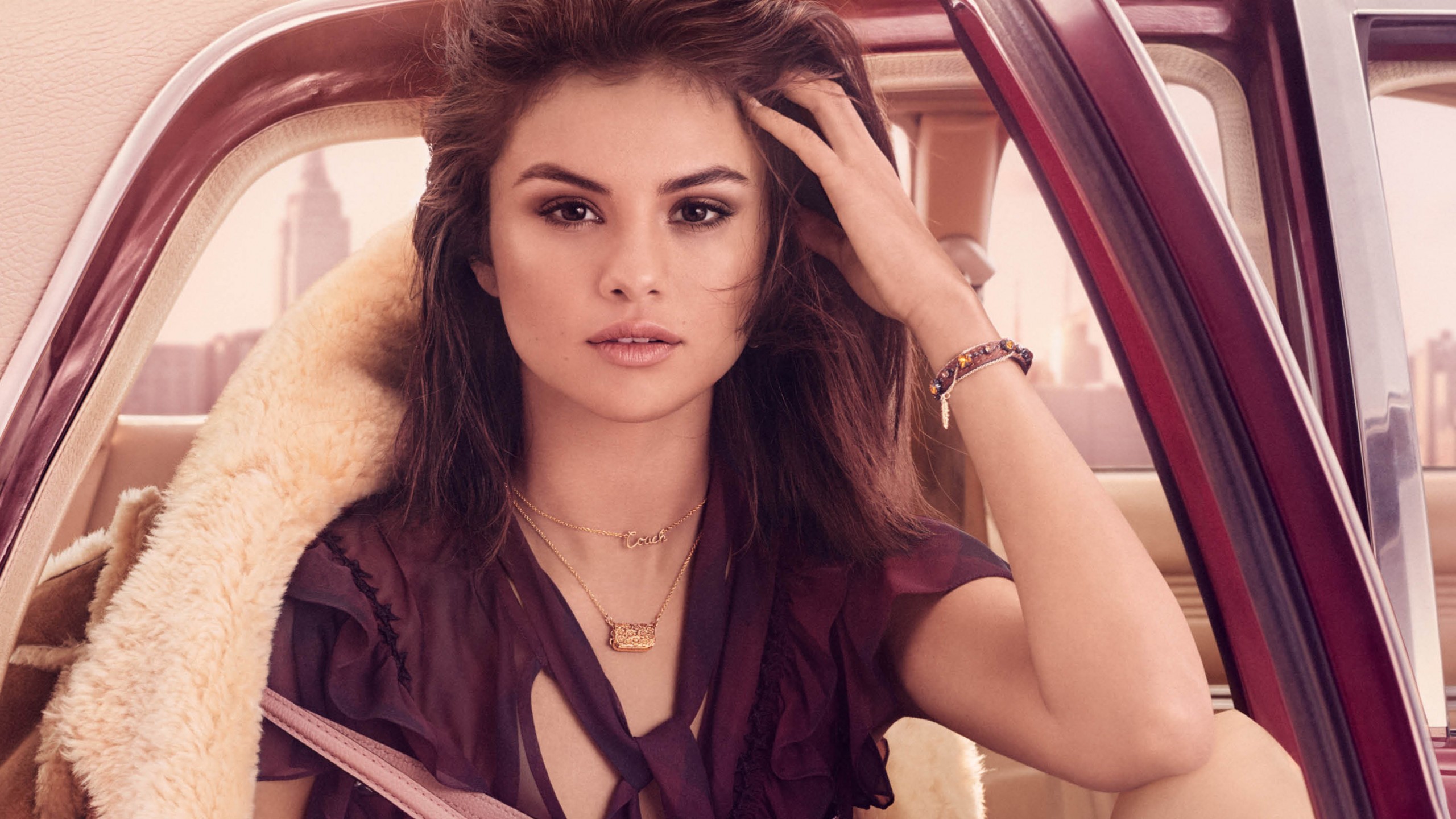 Selena Gomez in a car HD Wallpaper