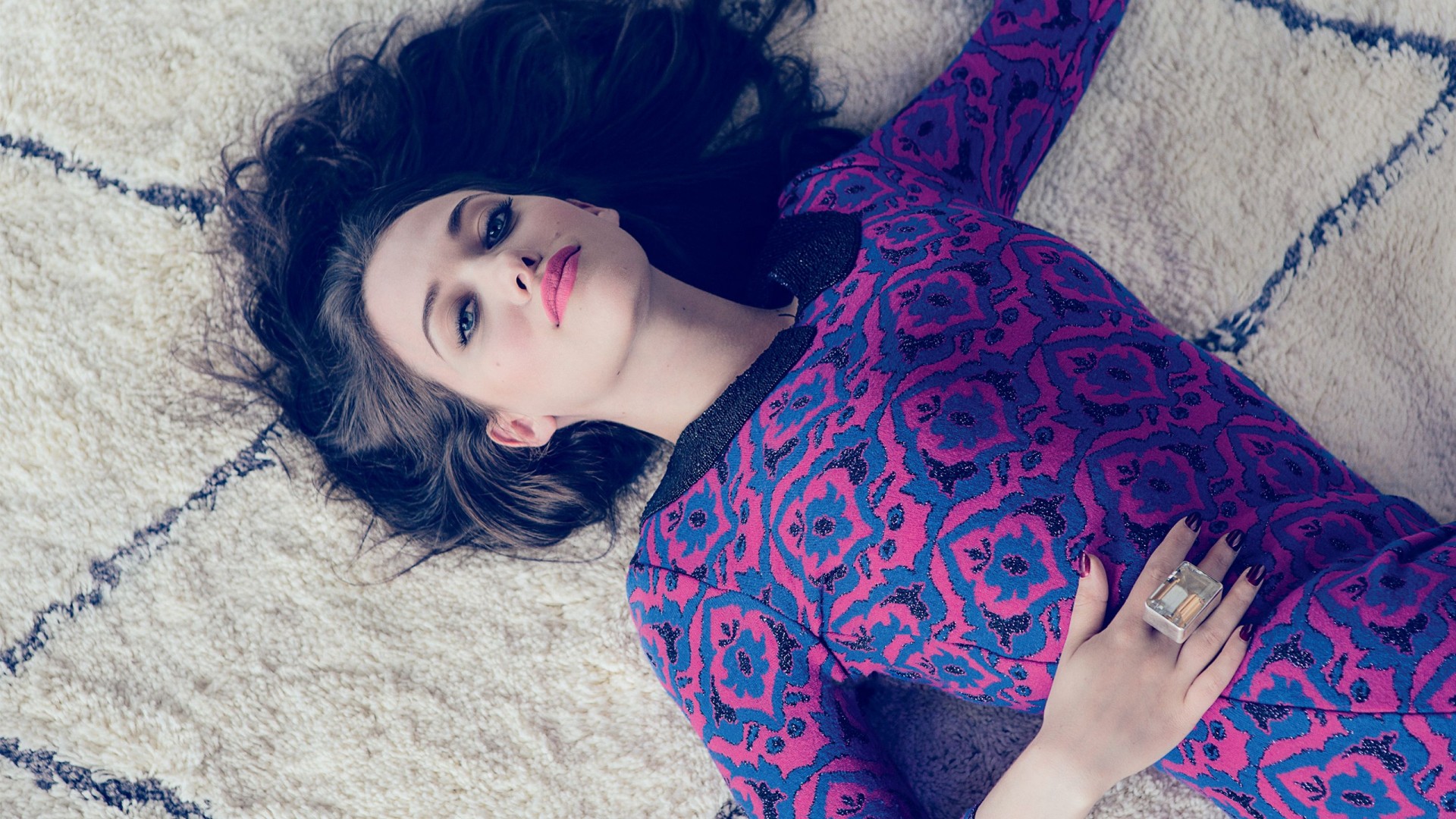 Kat Dennings lying on a rug HD Wallpaper