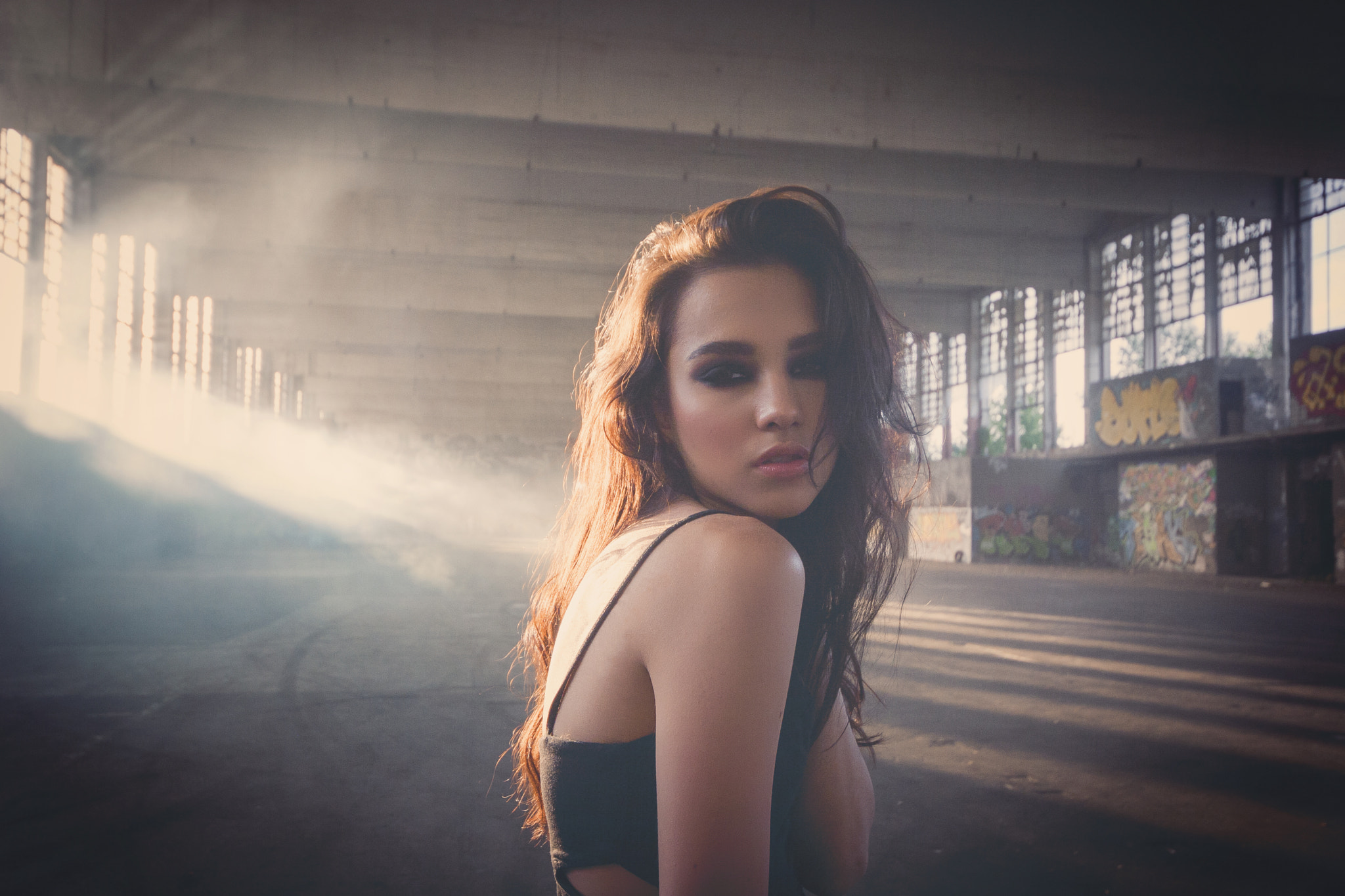 Woman posing in abandoned building with smoke HD Wallpaper